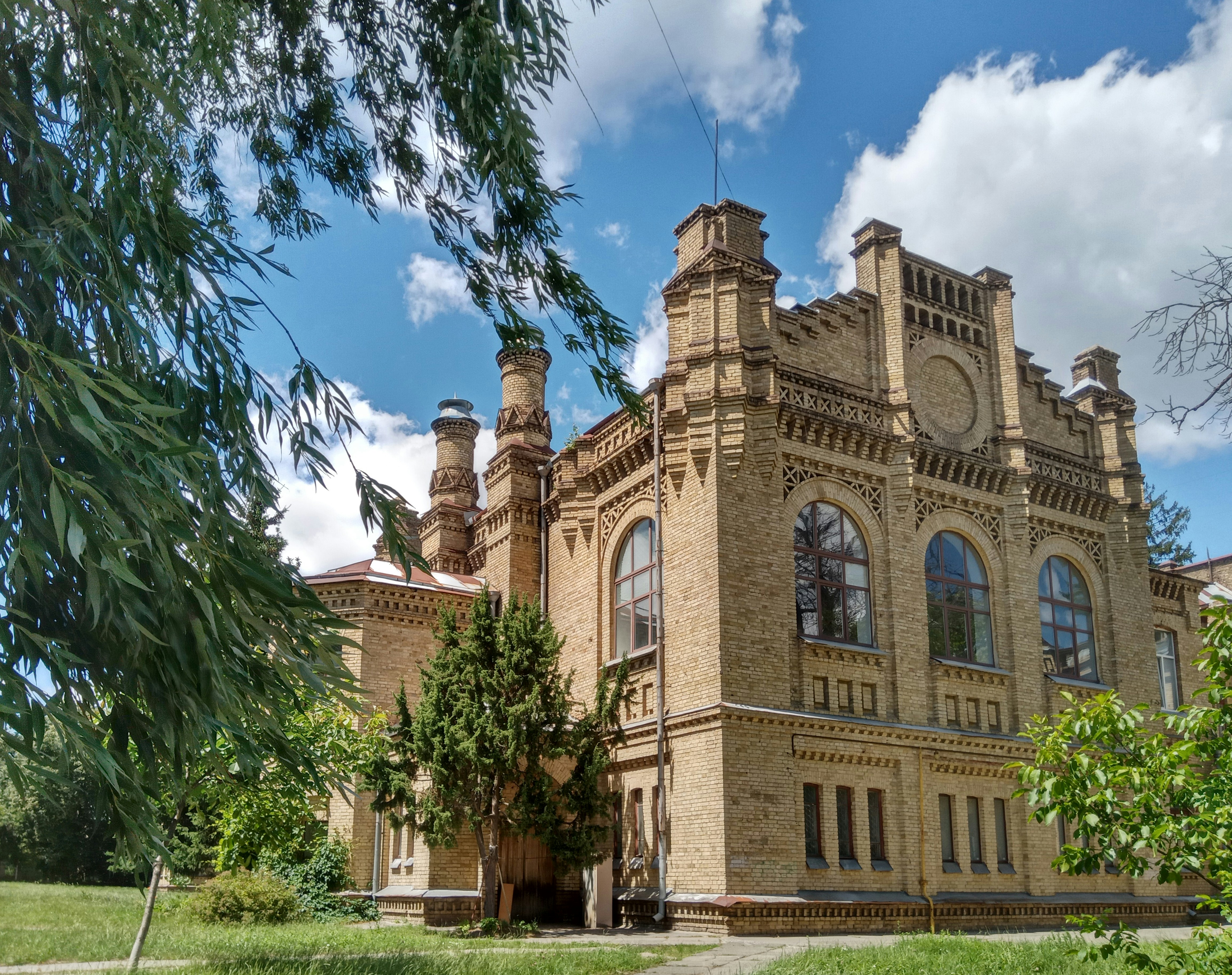 A large building with a clock on the front of it