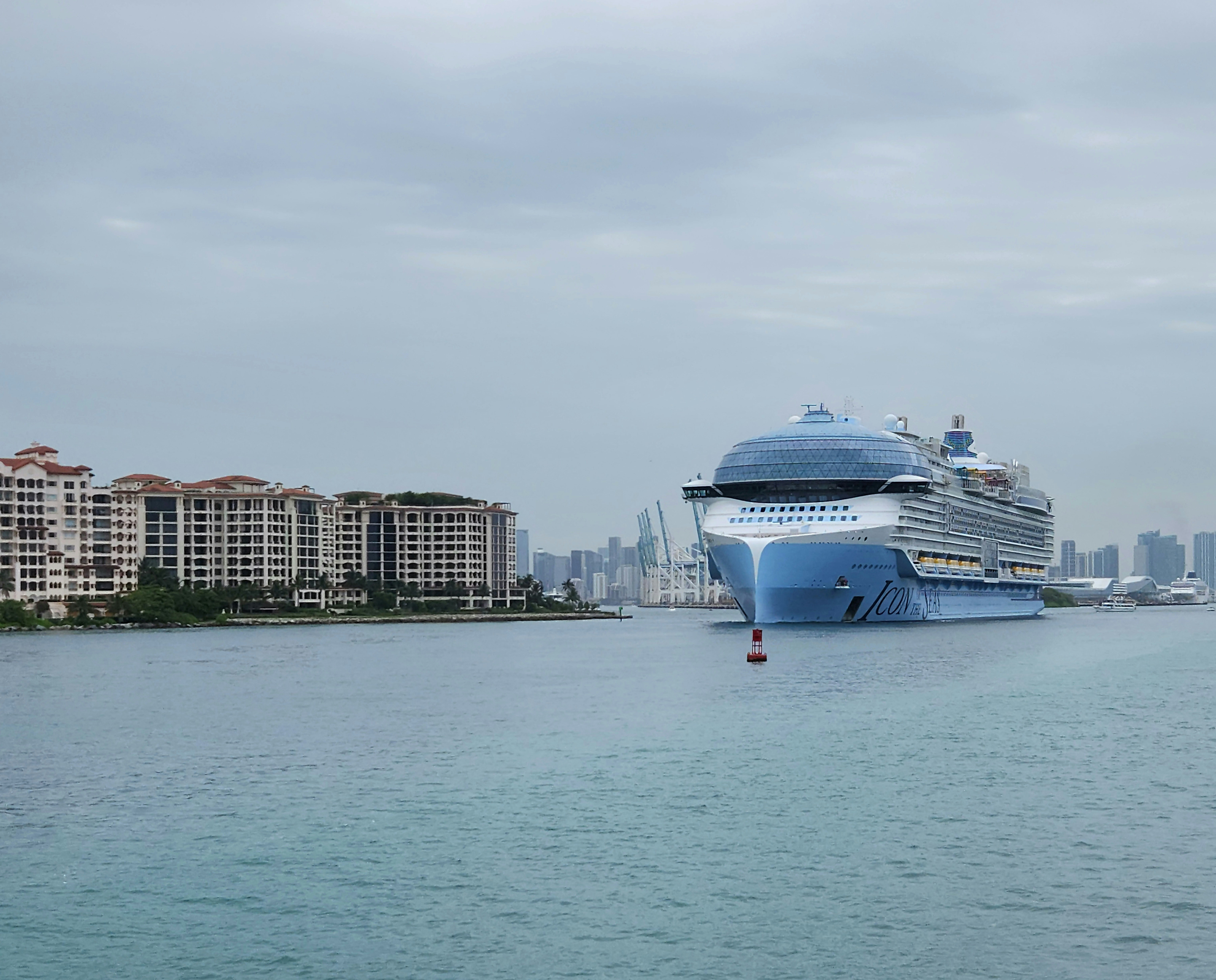 A large cruise ship in the middle of a body of water, Icon of the Seas is the lead ship of the Icon class. She entered service on 27 January 2024 out of the Port of Miami in the US. At 248,663 gross tonnage, Icon of the Seas is the largest cruise ship in the world.