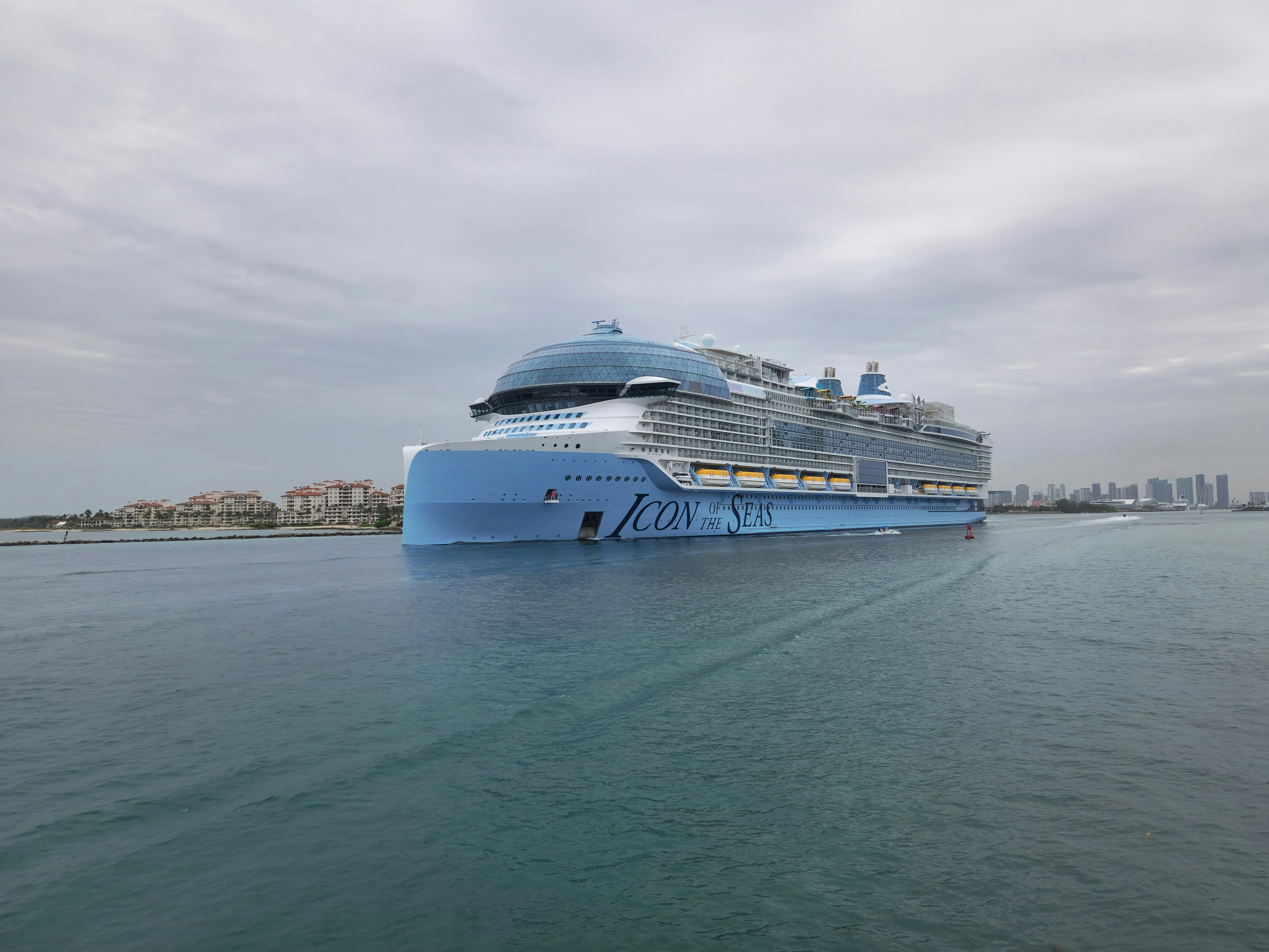 A large cruise ship in the middle of a body of water, Icon of the Seas is the lead ship of the Icon class. She entered service on 27 January 2024 out of the Port of Miami in the US. At 248,663 gross tonnage, Icon of the Seas is the largest cruise ship in the world.