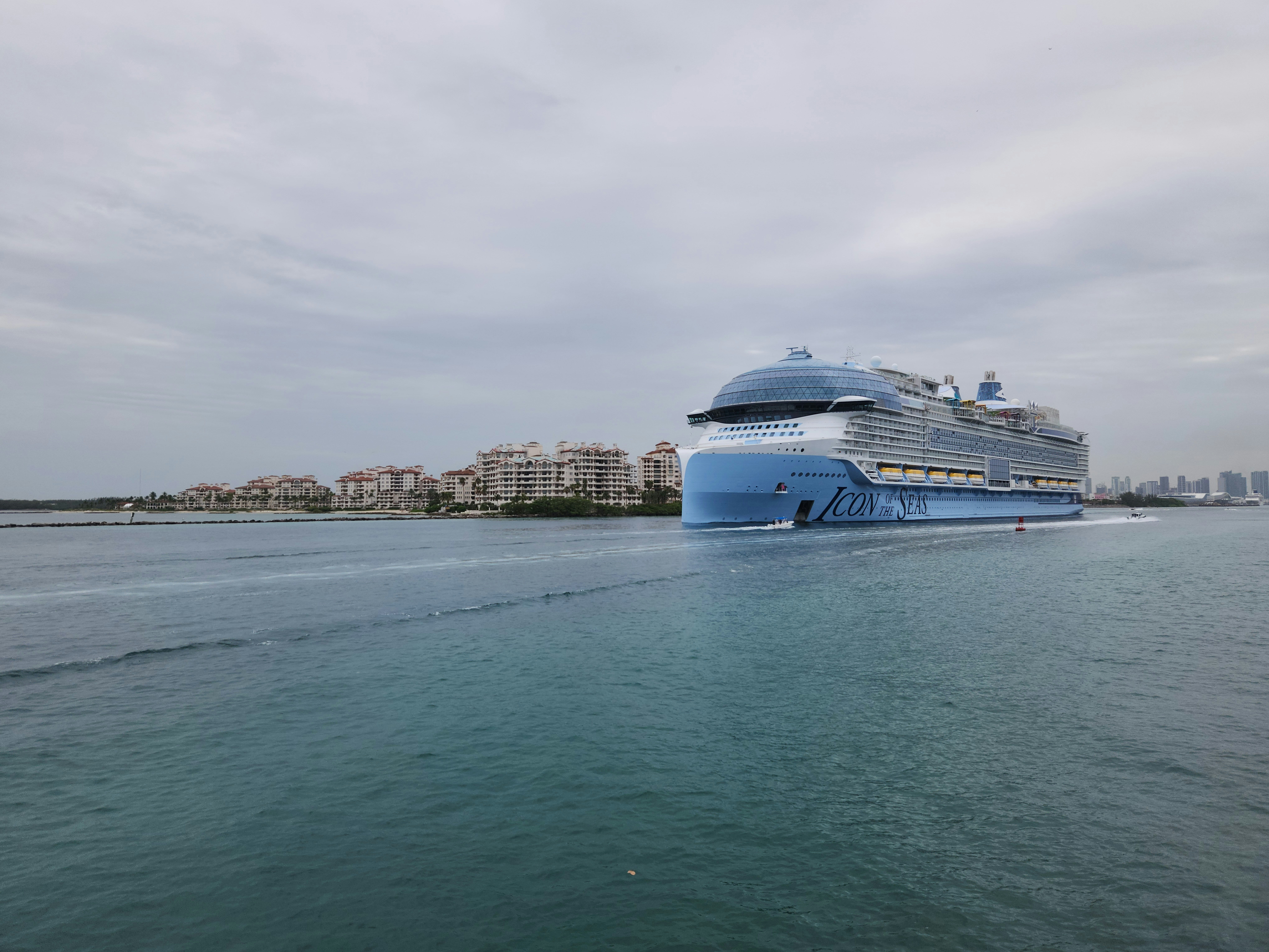 A large cruise ship in the middle of a body of water, Icon of the Seas is the lead ship of the Icon class. She entered service on 27 January 2024 out of the Port of Miami in the US. At 248,663 gross tonnage, Icon of the Seas is the largest cruise ship in the world.