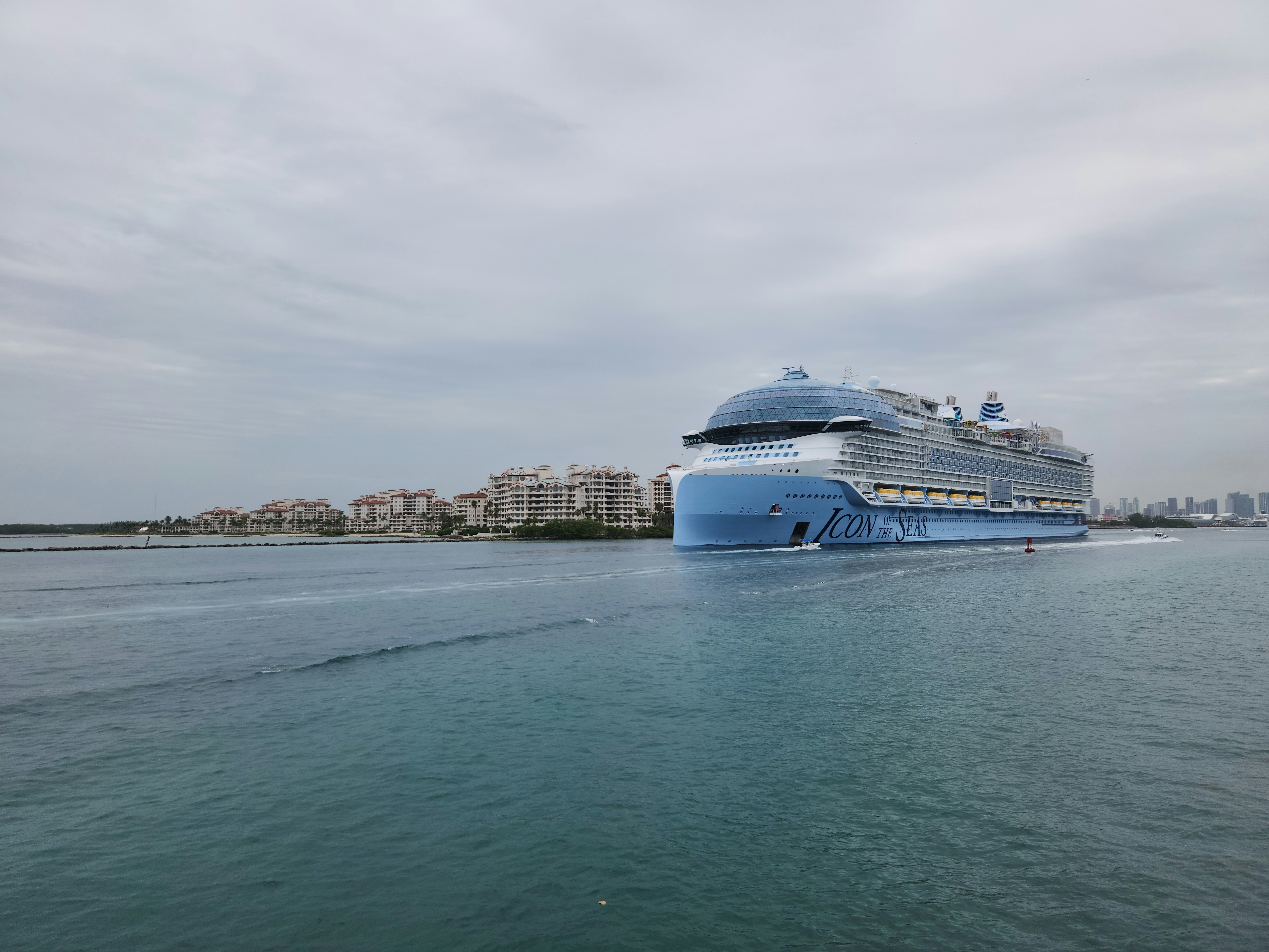 A large cruise ship in the middle of a body of water, Icon of the Seas is the lead ship of the Icon class. She entered service on 27 January 2024 out of the Port of Miami in the US. At 248,663 gross tonnage, Icon of the Seas is the largest cruise ship in the world.