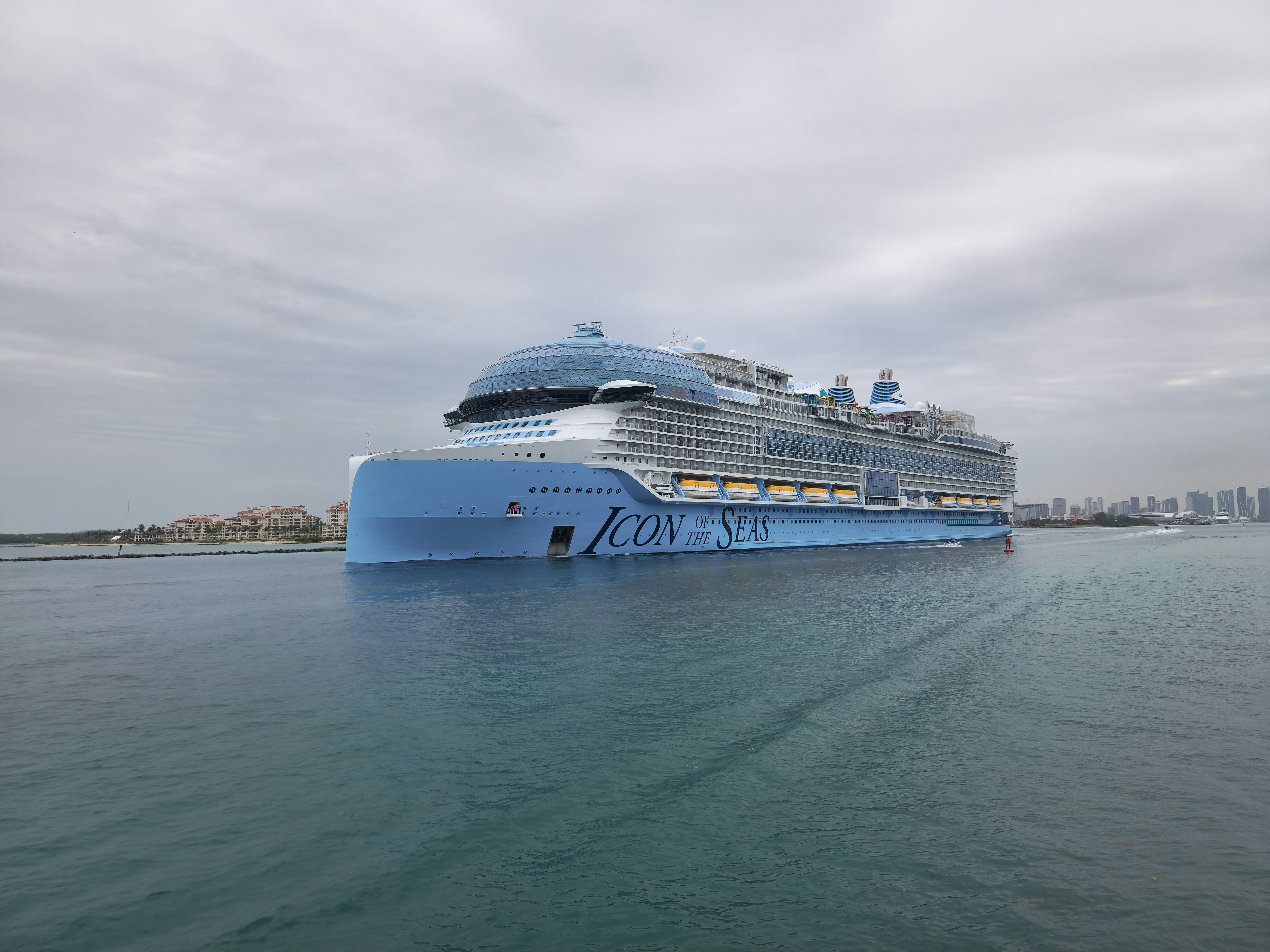 A large cruise ship in the middle of a body of water, Icon of the Seas is the lead ship of the Icon class. She entered service on 27 January 2024 out of the Port of Miami in the US. At 248,663 gross tonnage, Icon of the Seas is the largest cruise ship in the world.
