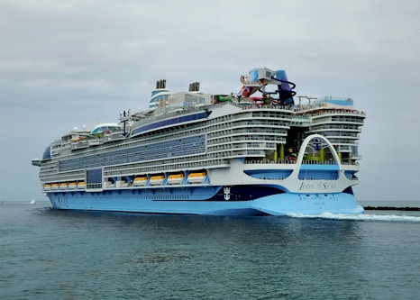 A large cruise ship in the middle of the ocean