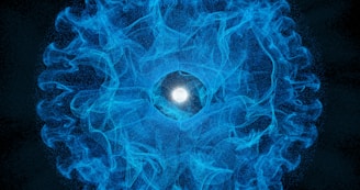 A blue ball of fire with a black background