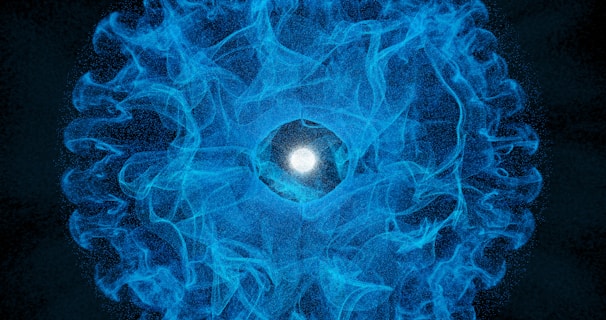 A blue ball of fire with a black background