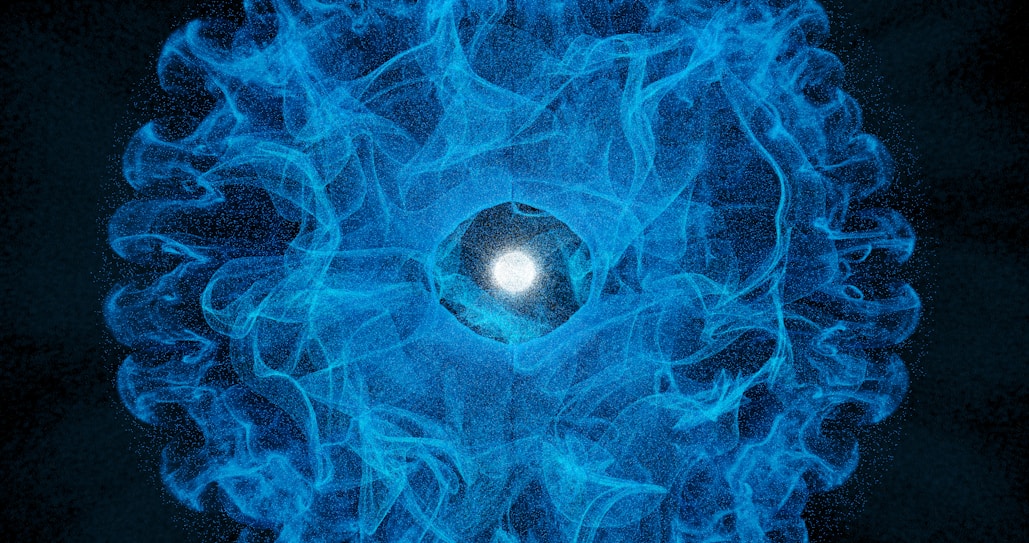 A blue ball of fire with a black background