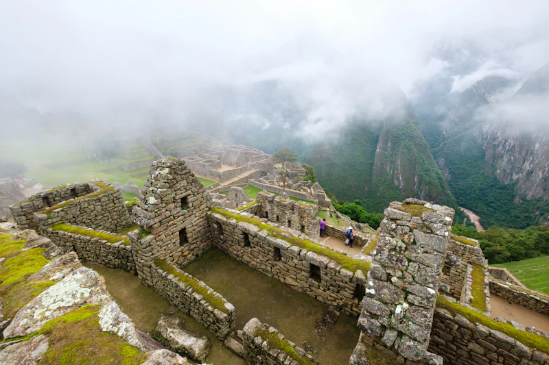 Andean peaks rising out of the fog above Machu Picchu