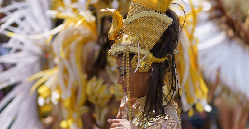 A woman wearing a headdress in a parade