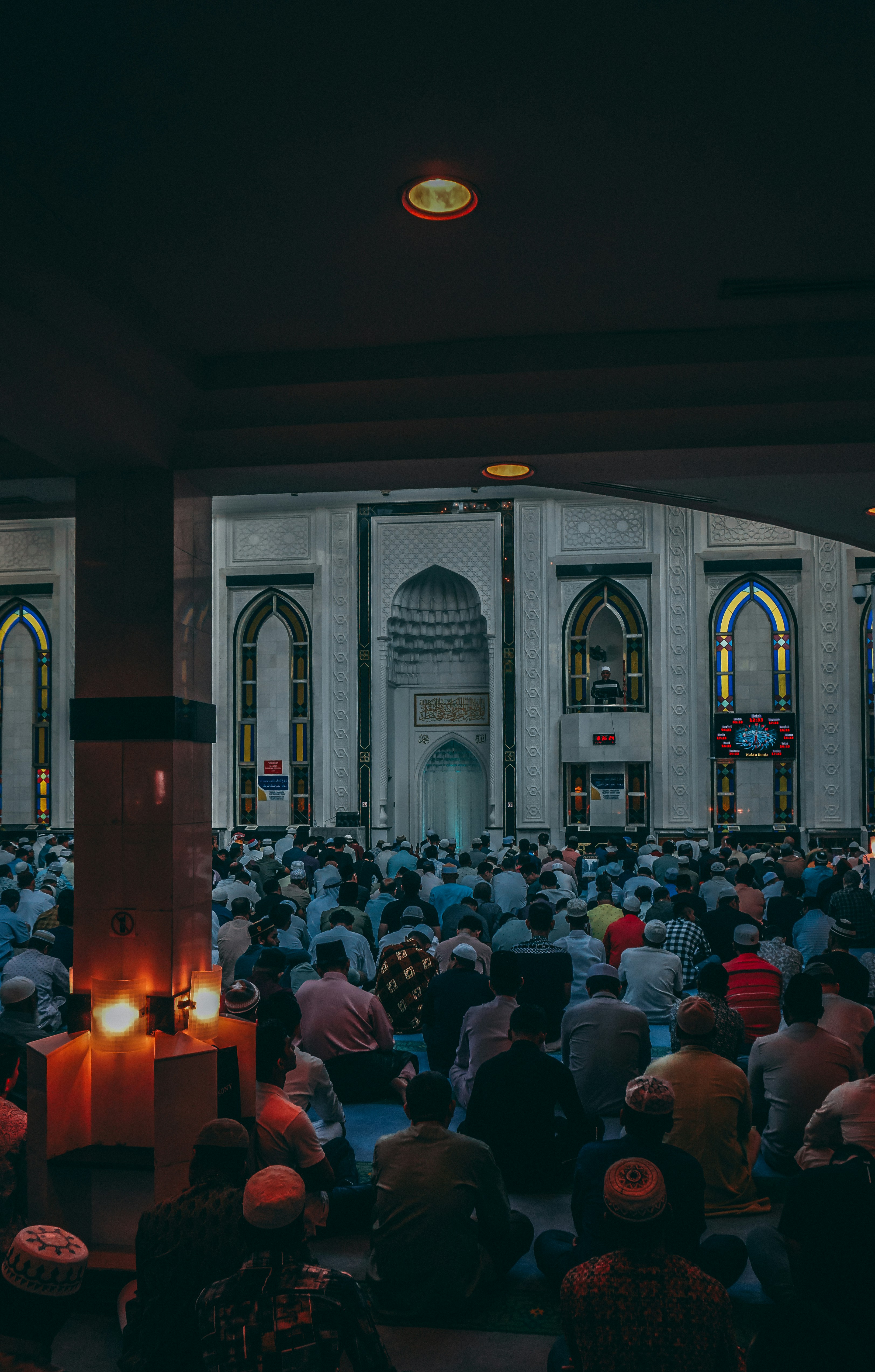 A large group of people sitting in a room