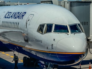 A large jetliner sitting on top of an airport tarmac