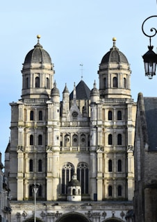 A large building with a clock on the front of it