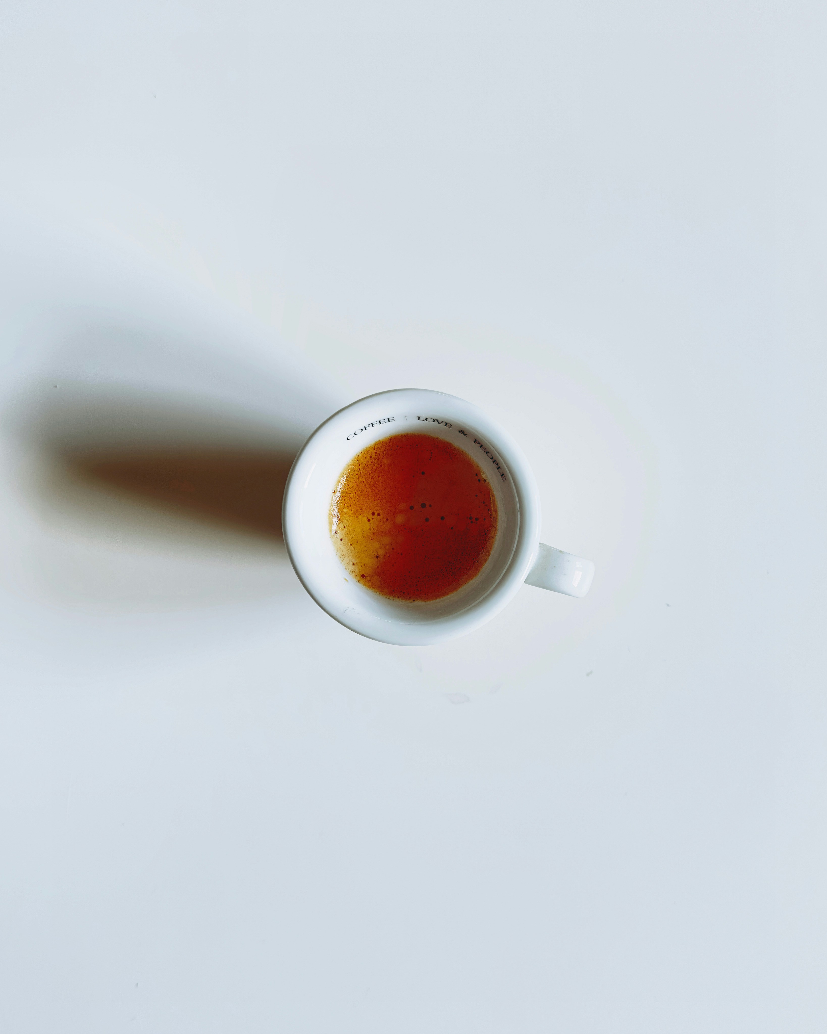 A cup of tea on a white surface