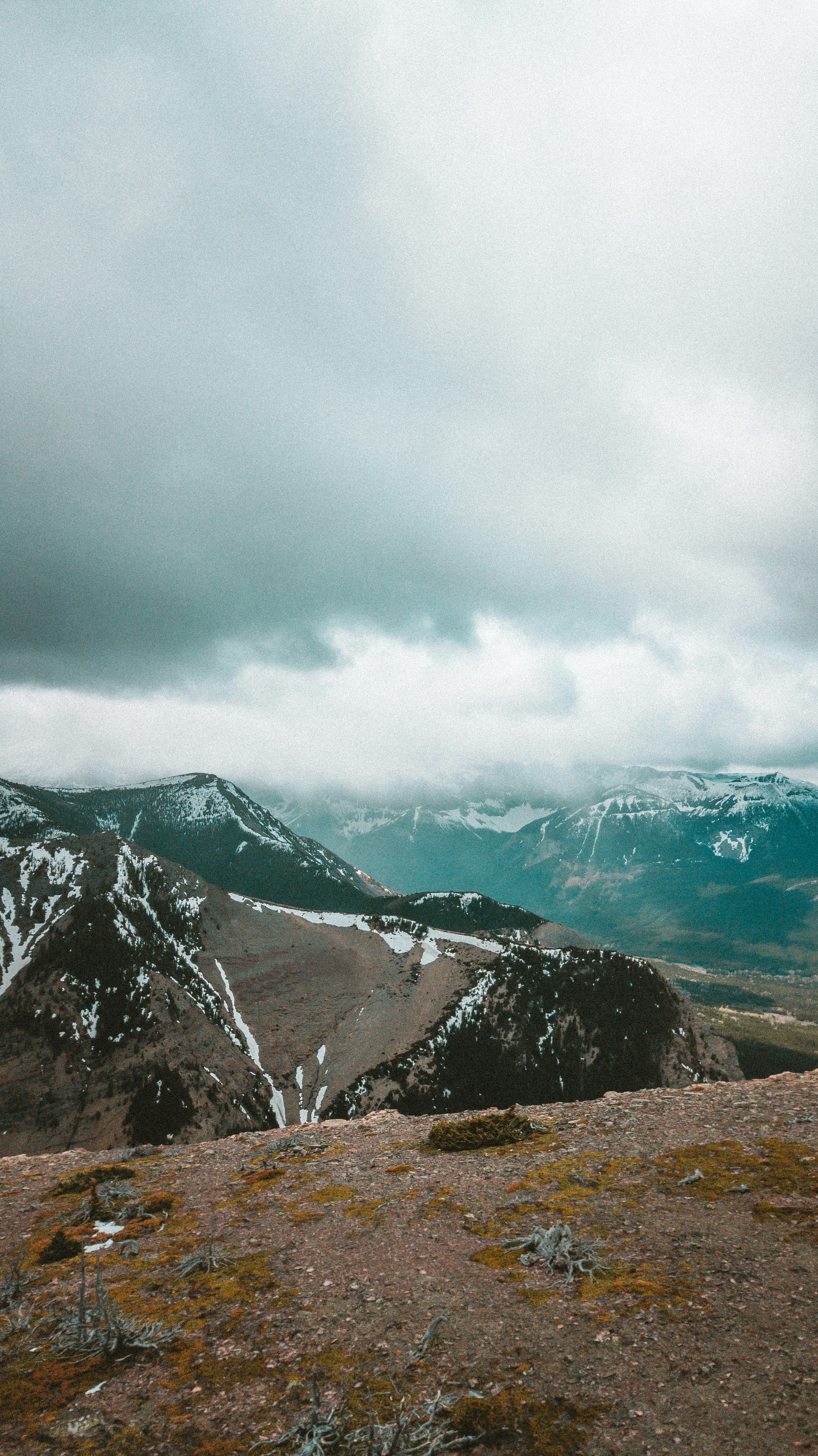 A person standing on top of a mountain