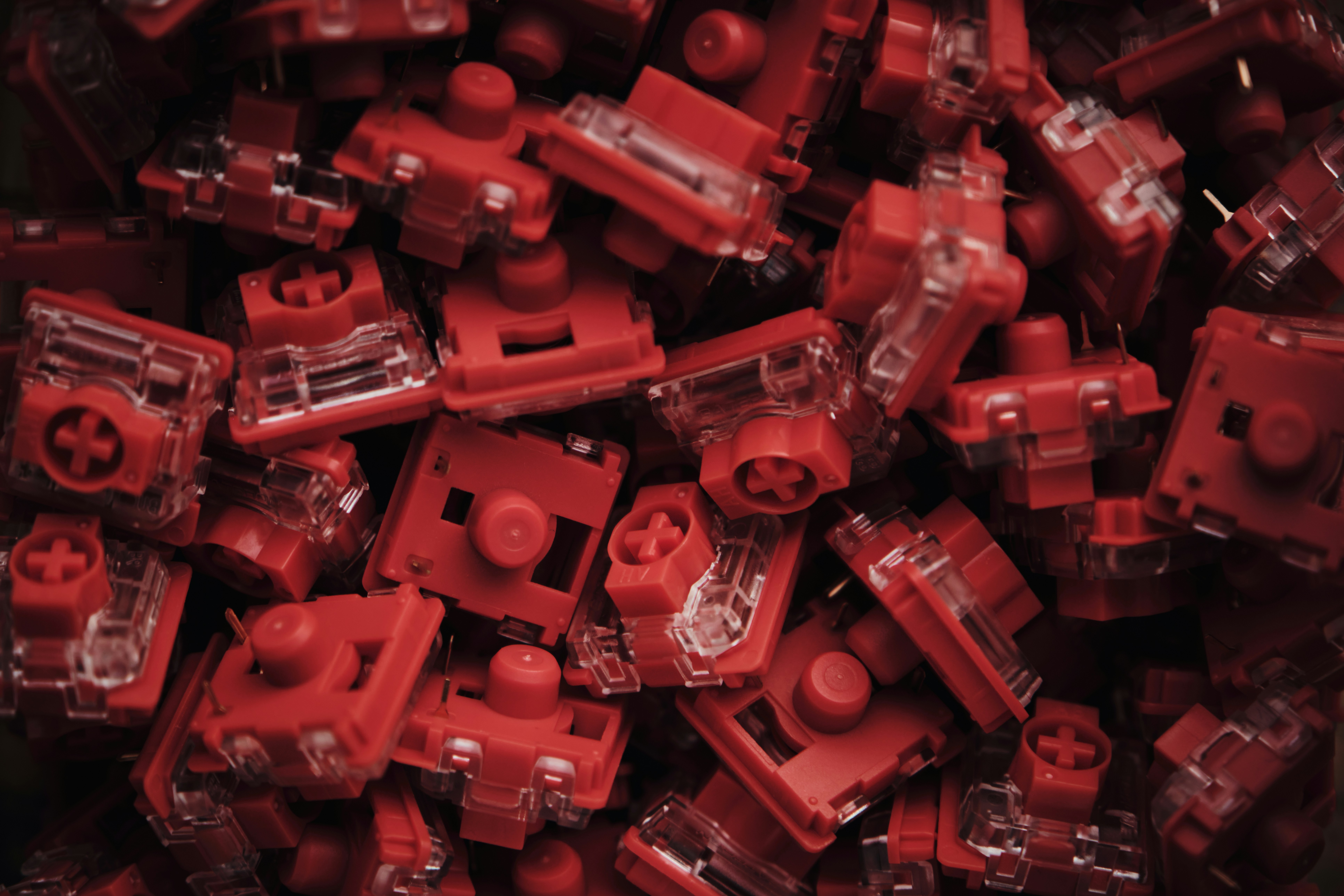 A pile of red legos sitting next to each other