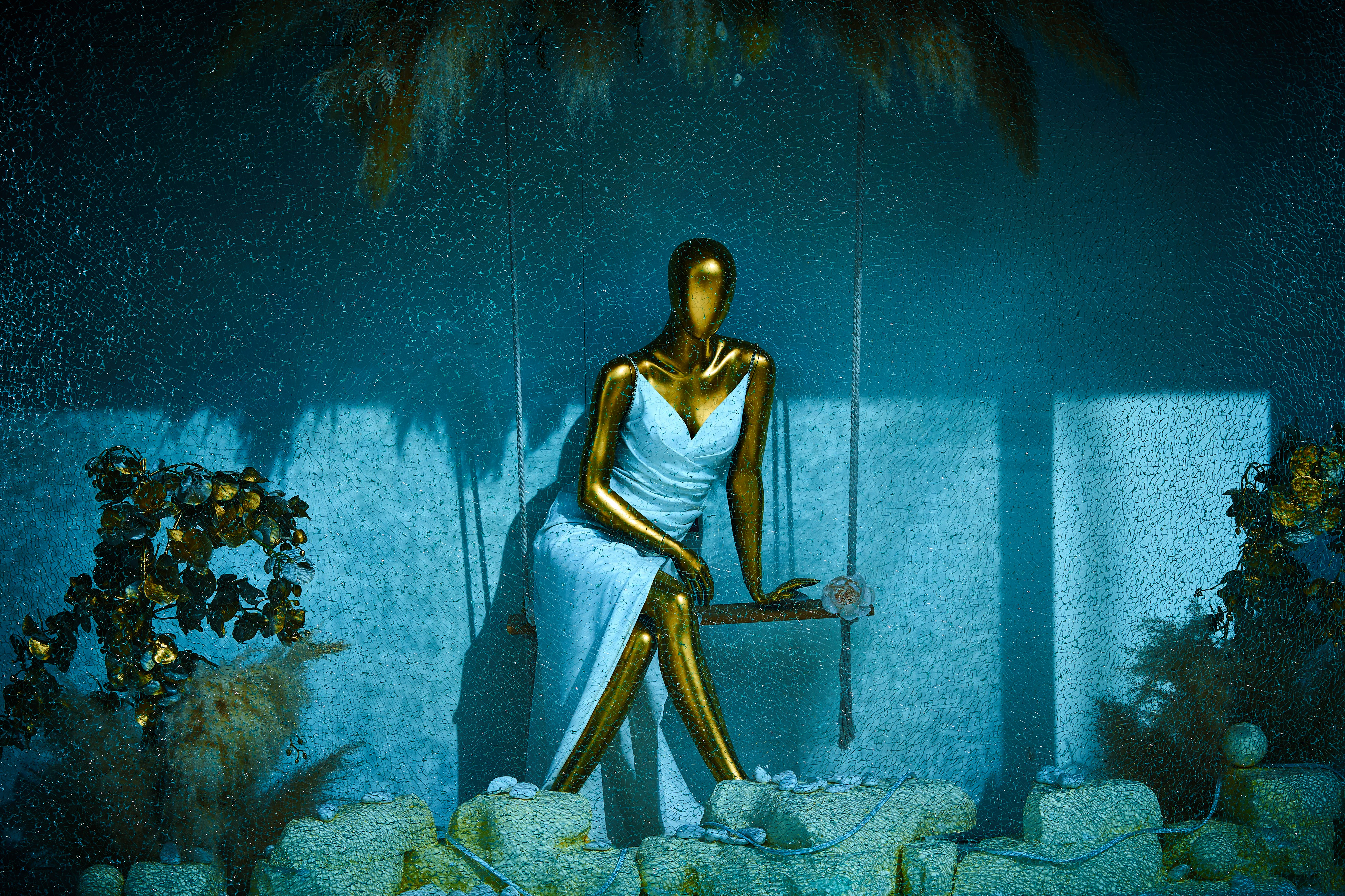 Painting of woman on bench