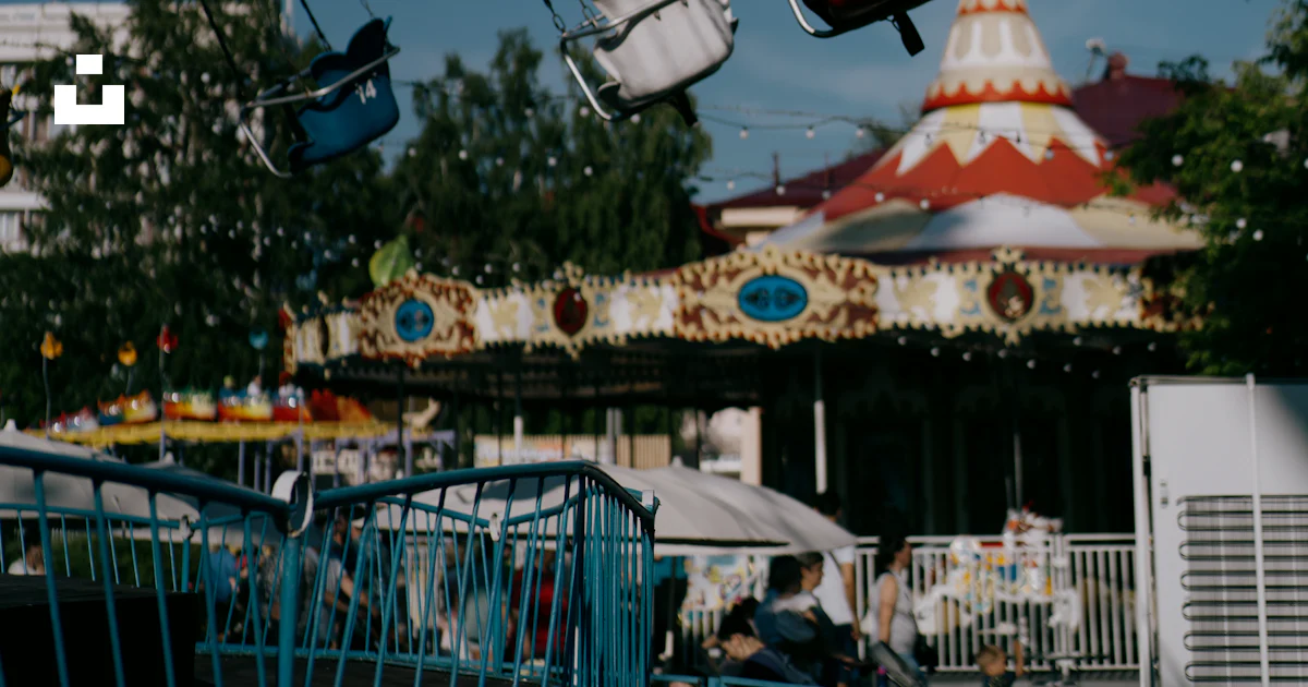 Mouse Carnival Ride A carnival ride with mickey mouse and other rides photo – Free Human ...