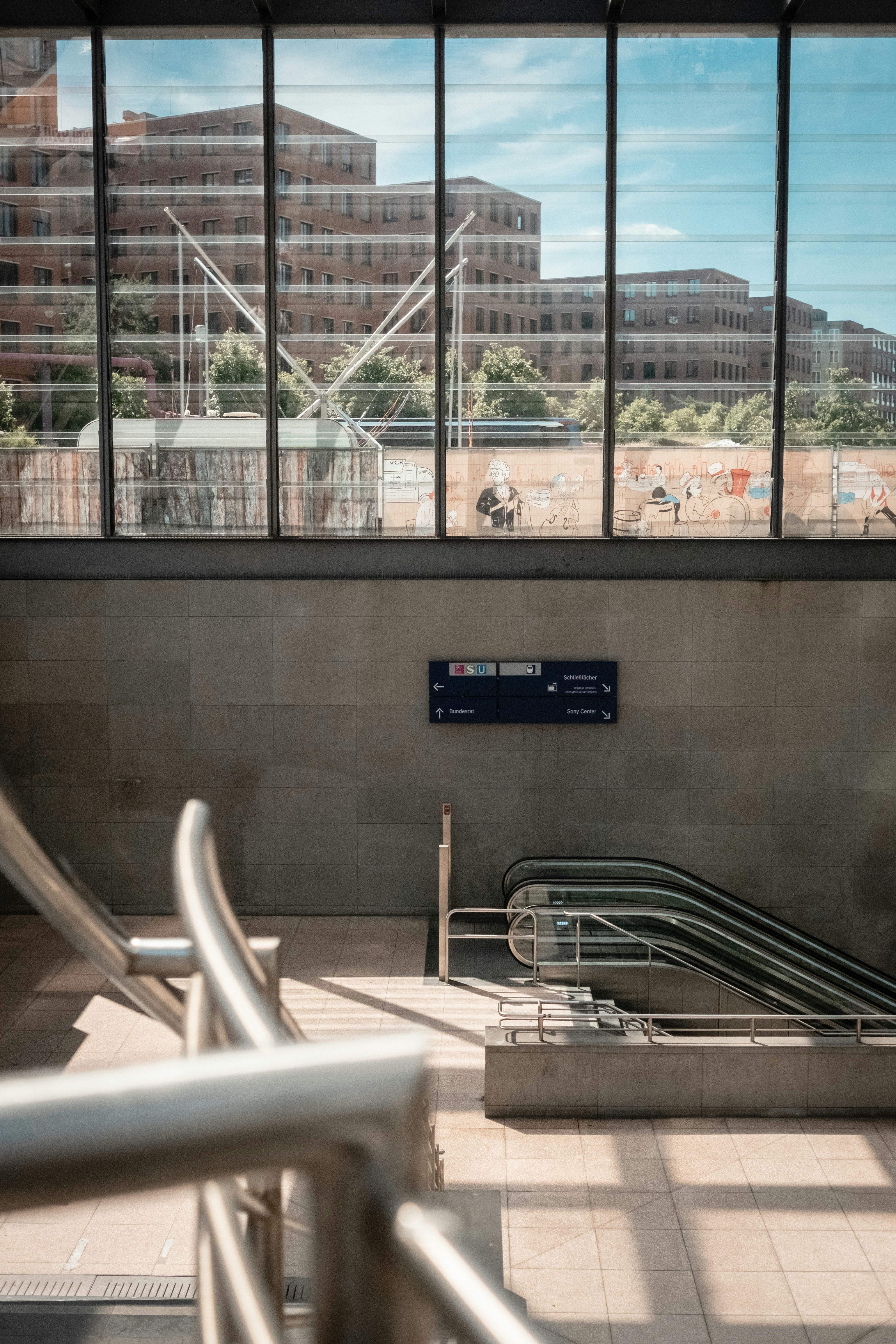 A view of a building through a window photo – Free Building Image on ...