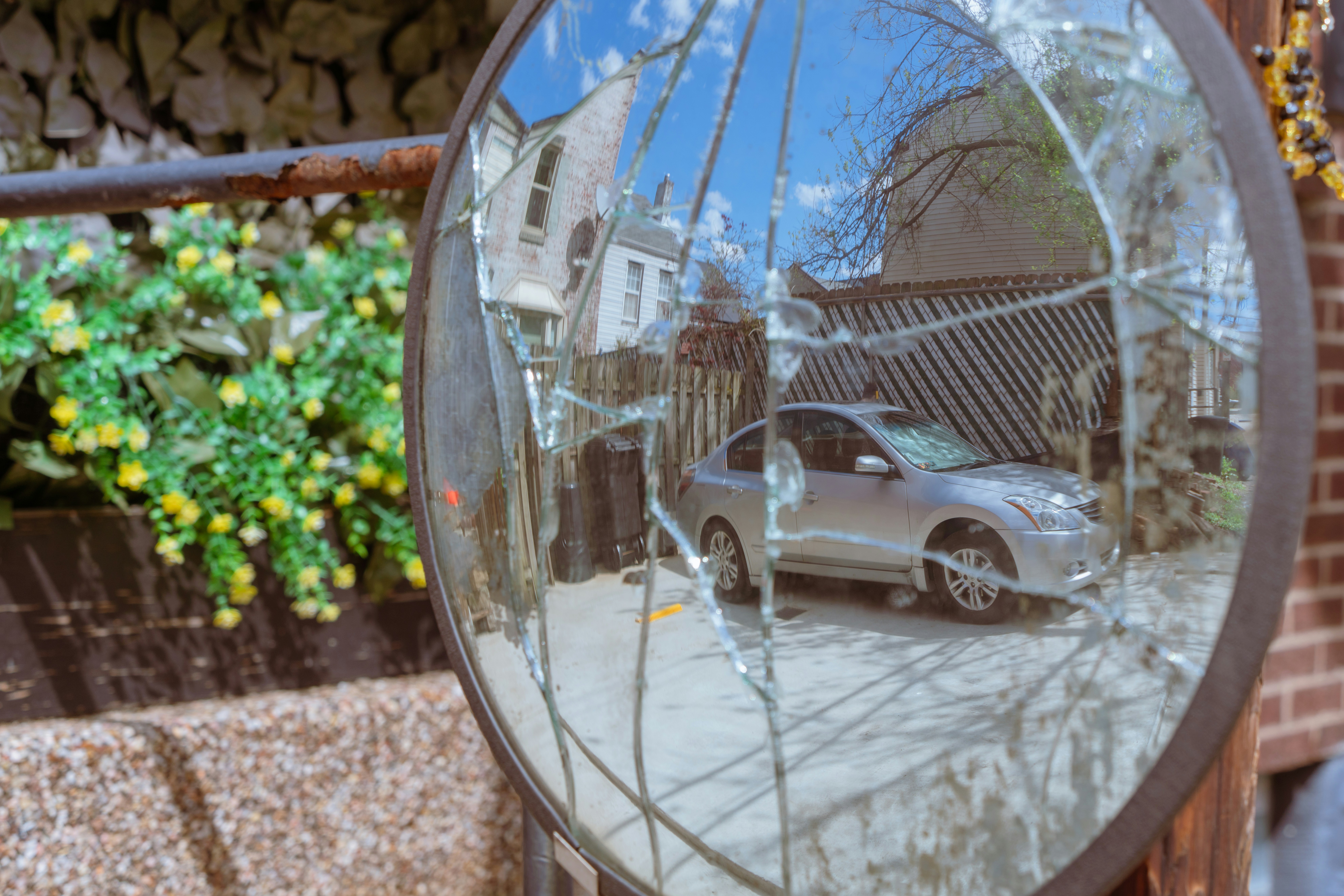 A reflection of a car in a mirror