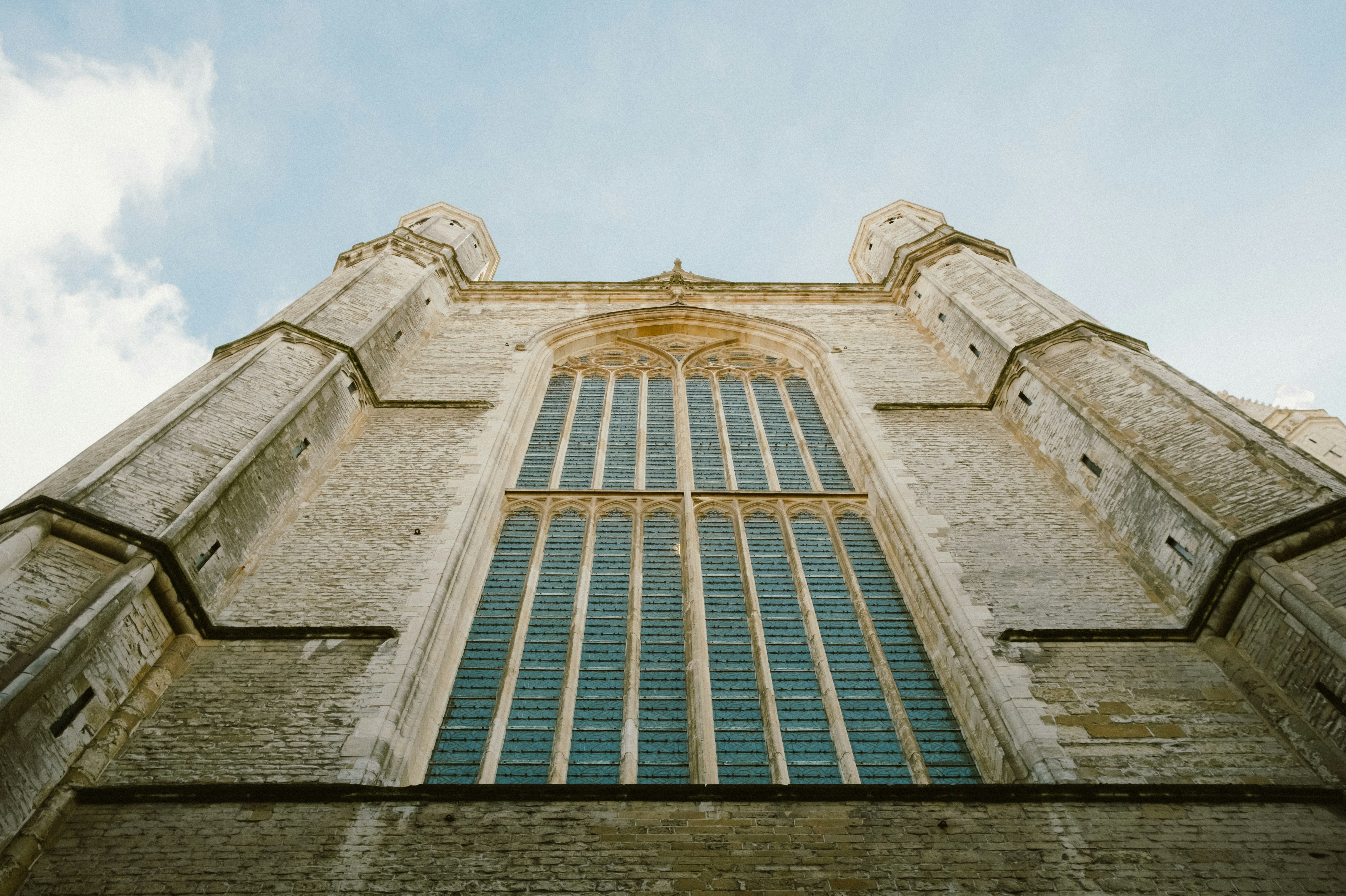 A very tall building with a sky in the background
