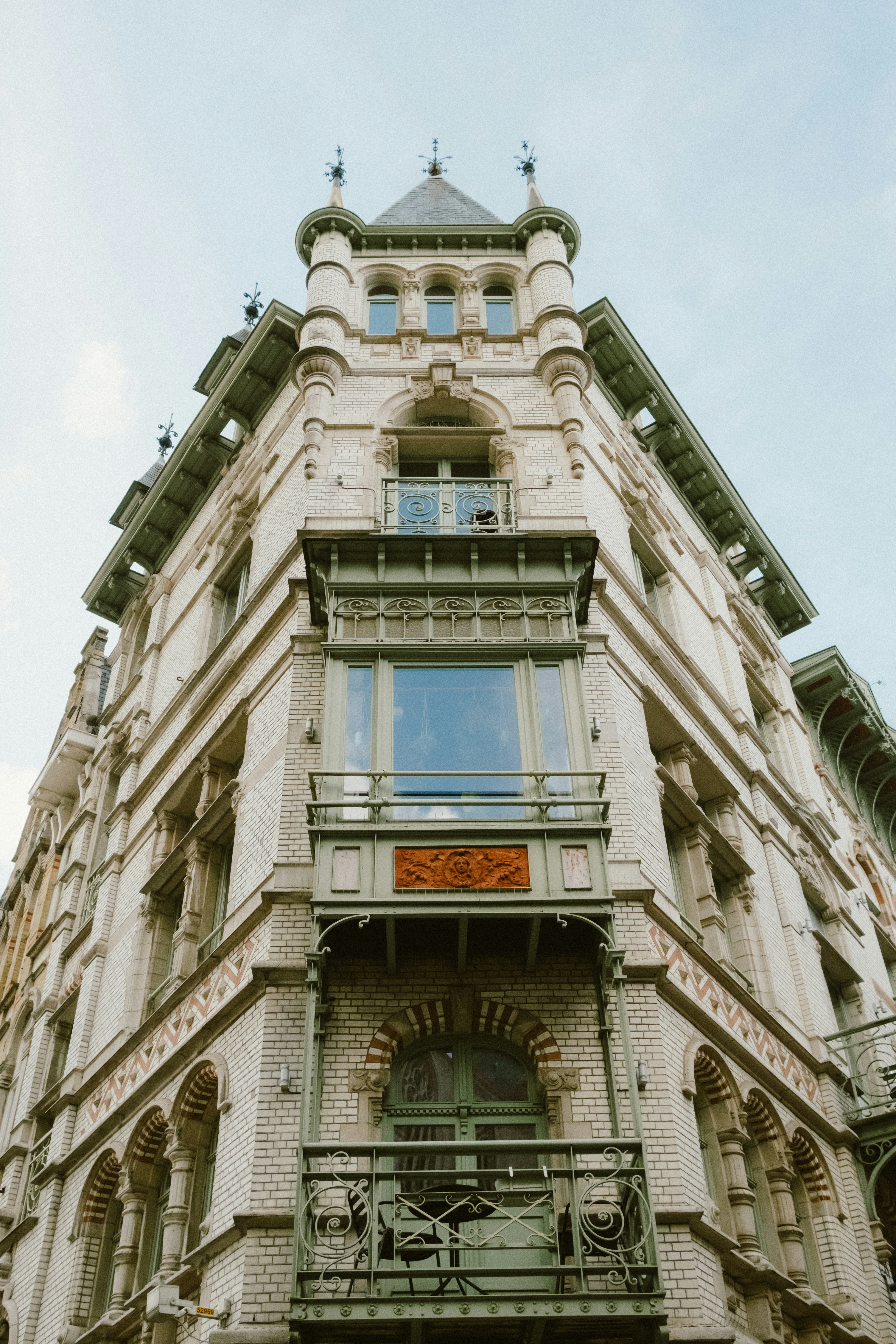 A tall building with a clock on the front of it