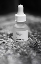 A bottle of ordinary sitting on a table