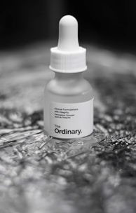 A bottle of ordinary sitting on a table