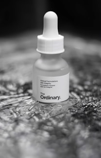 A bottle of ordinary sitting on a table