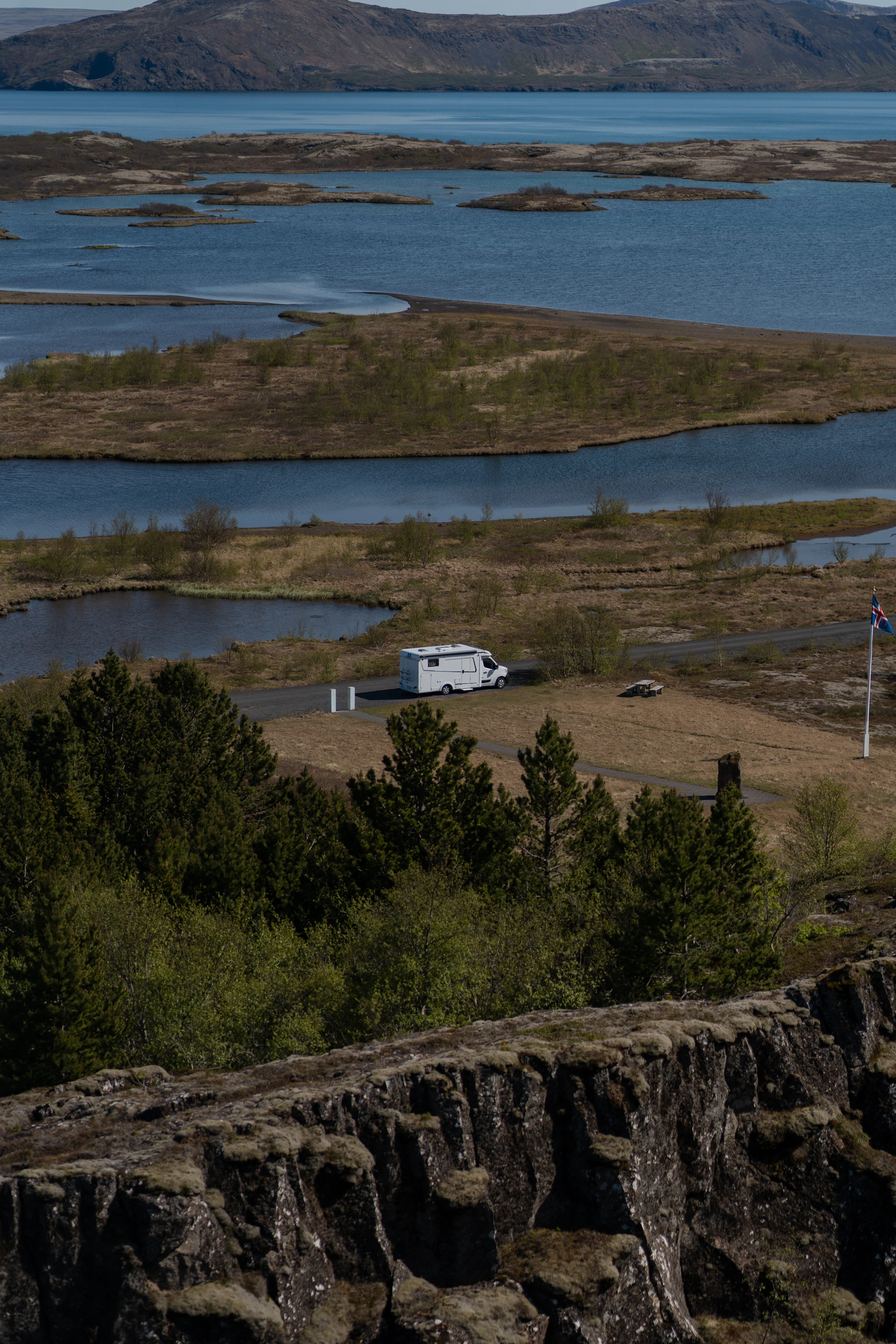 A view of a body of water from a hill