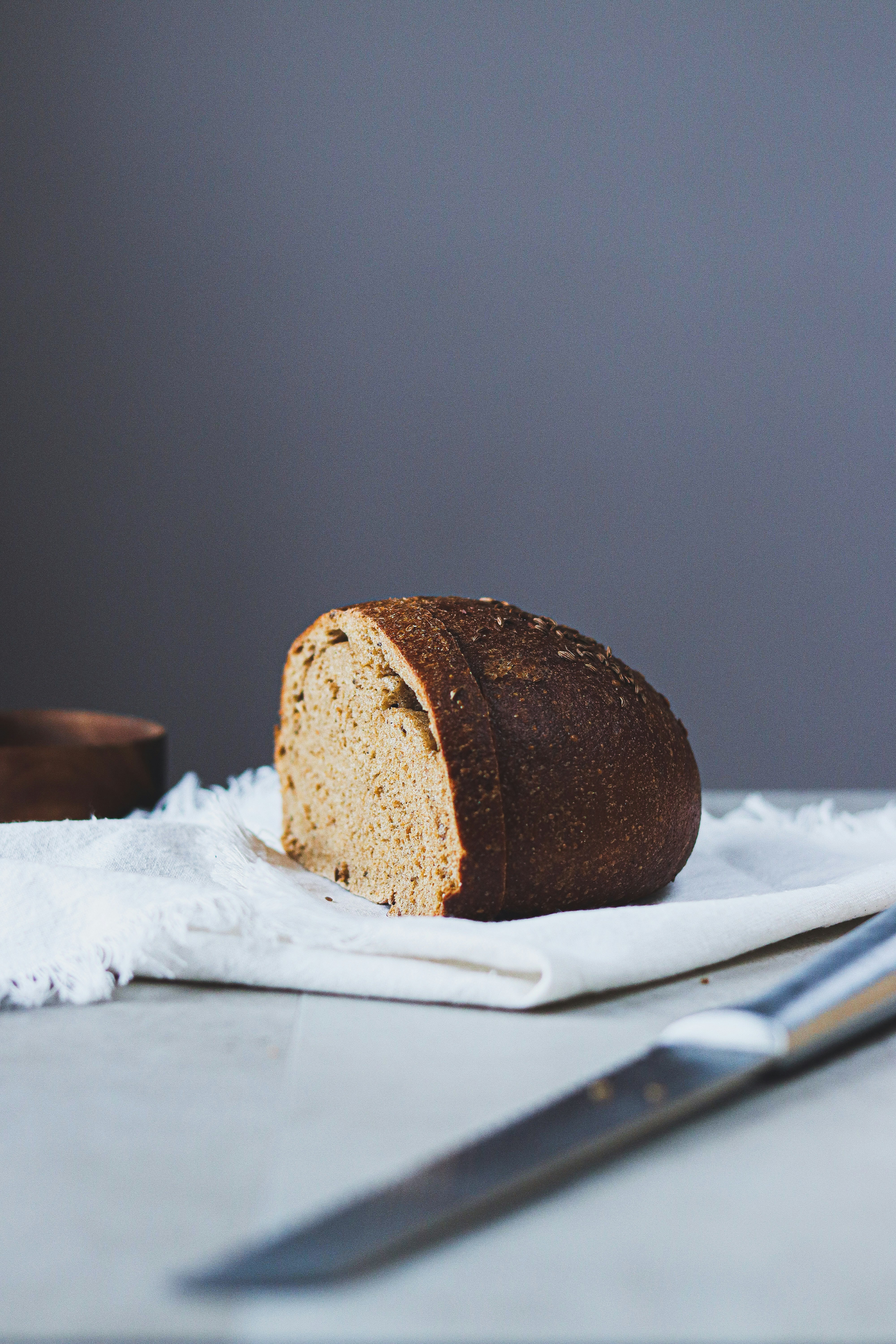 A loaf of bread sitting on top of a white plate