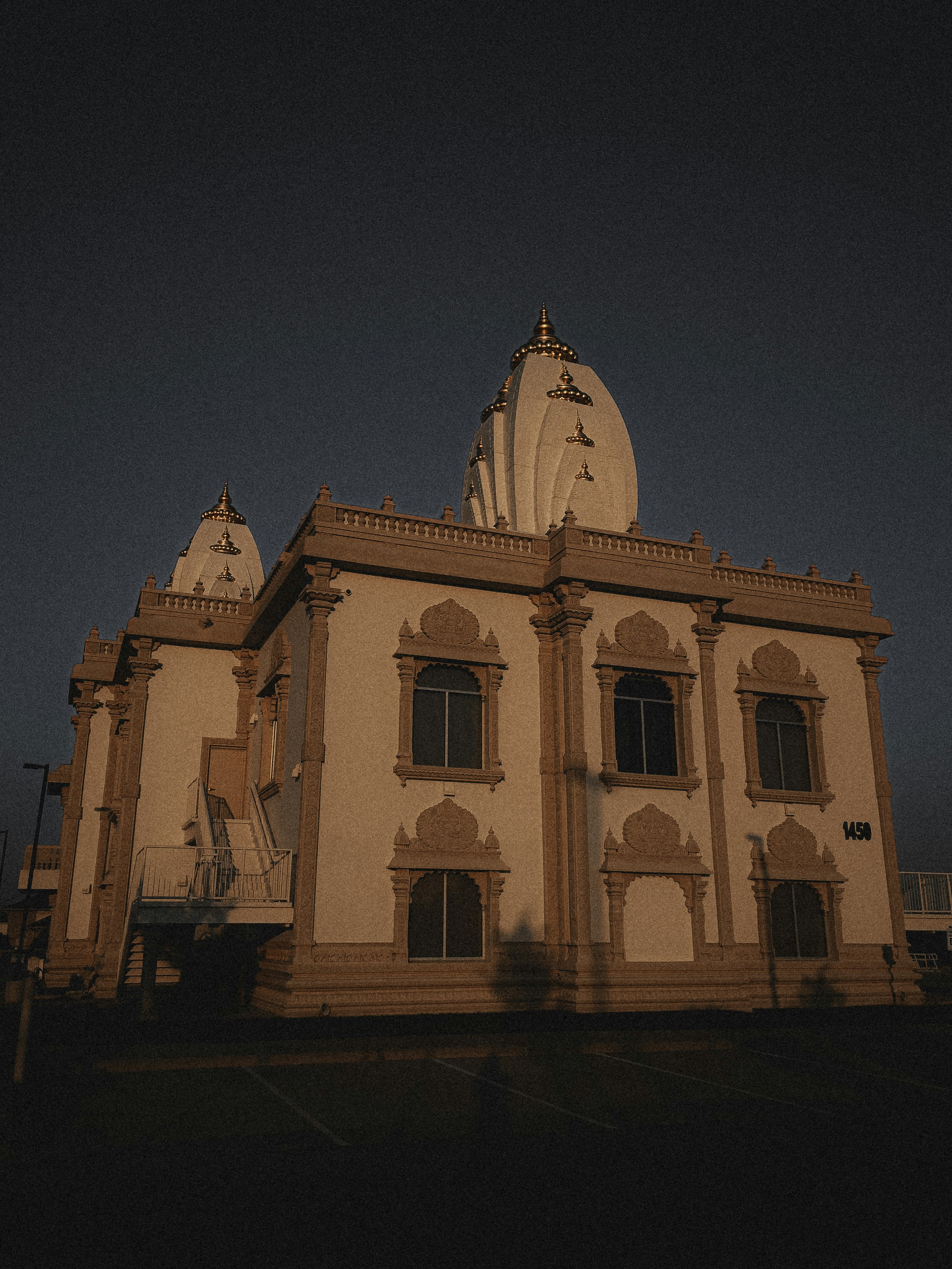 A large building with a clock on the top of it