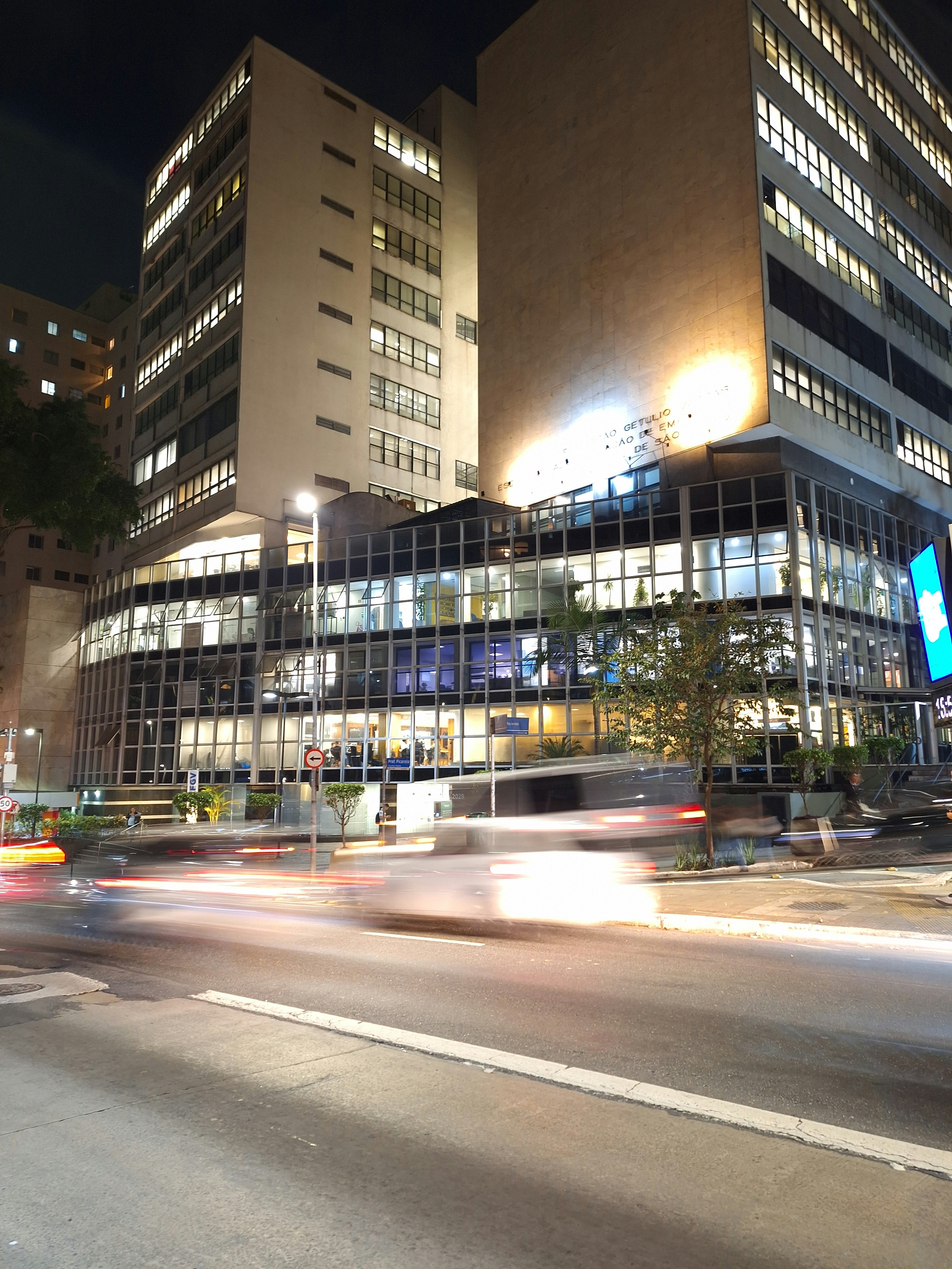 A blurry photo of a city street at night
