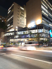 A blurry photo of a city street at night