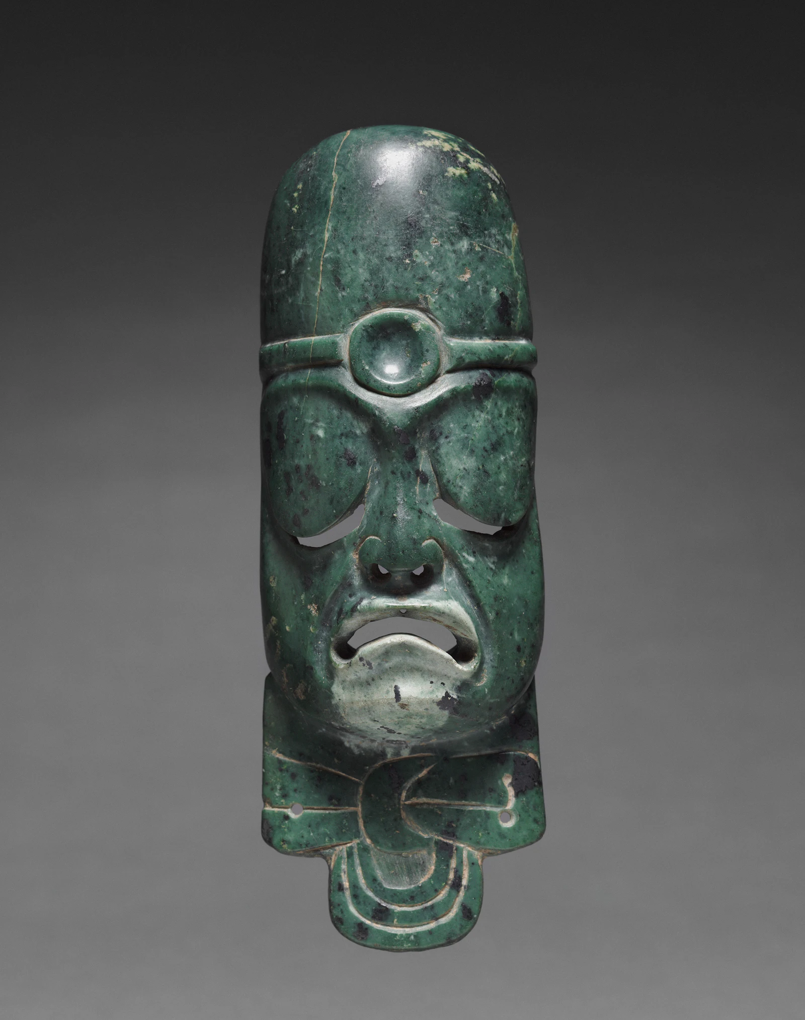 Máscara de jade tallada