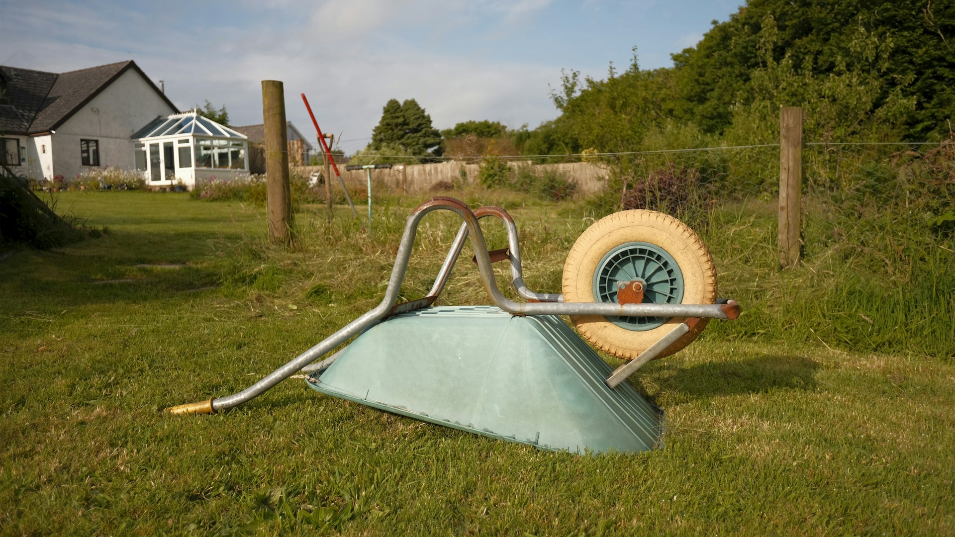 A broken down playground equipment in a yard