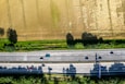 An aerial view of a highway with cars on it