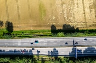 An aerial view of a highway with cars on it