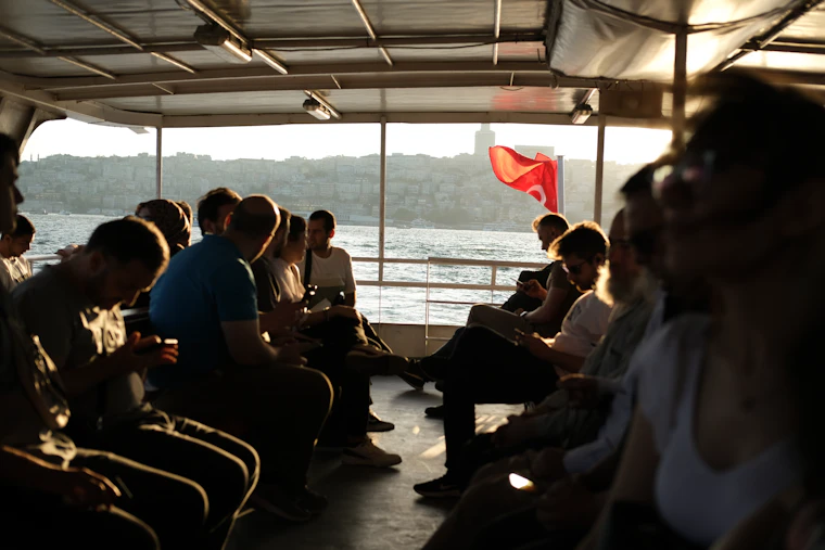 Travellers aboard an Istanbul Bosphorus ferry