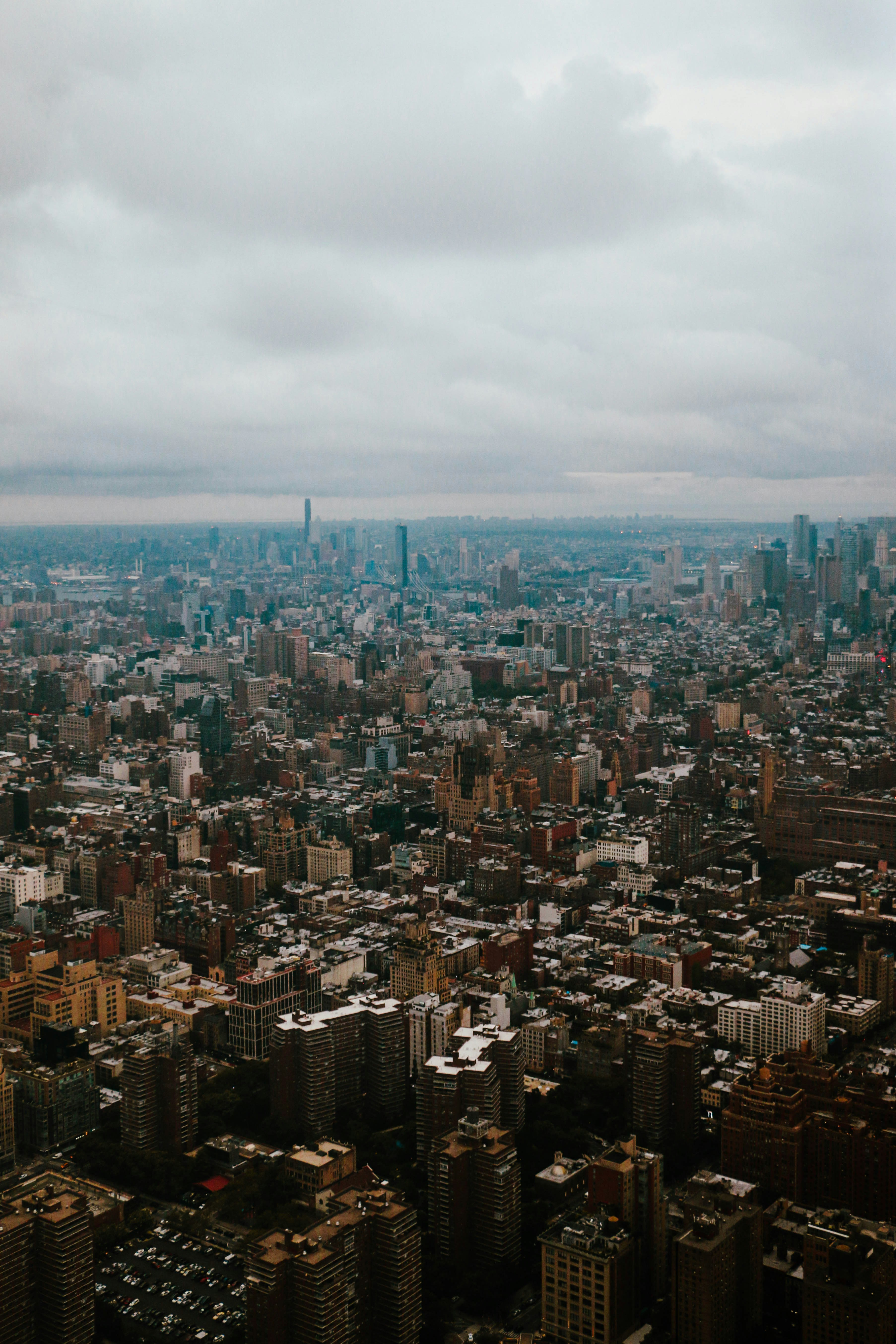 An aerial view of a city with tall buildings