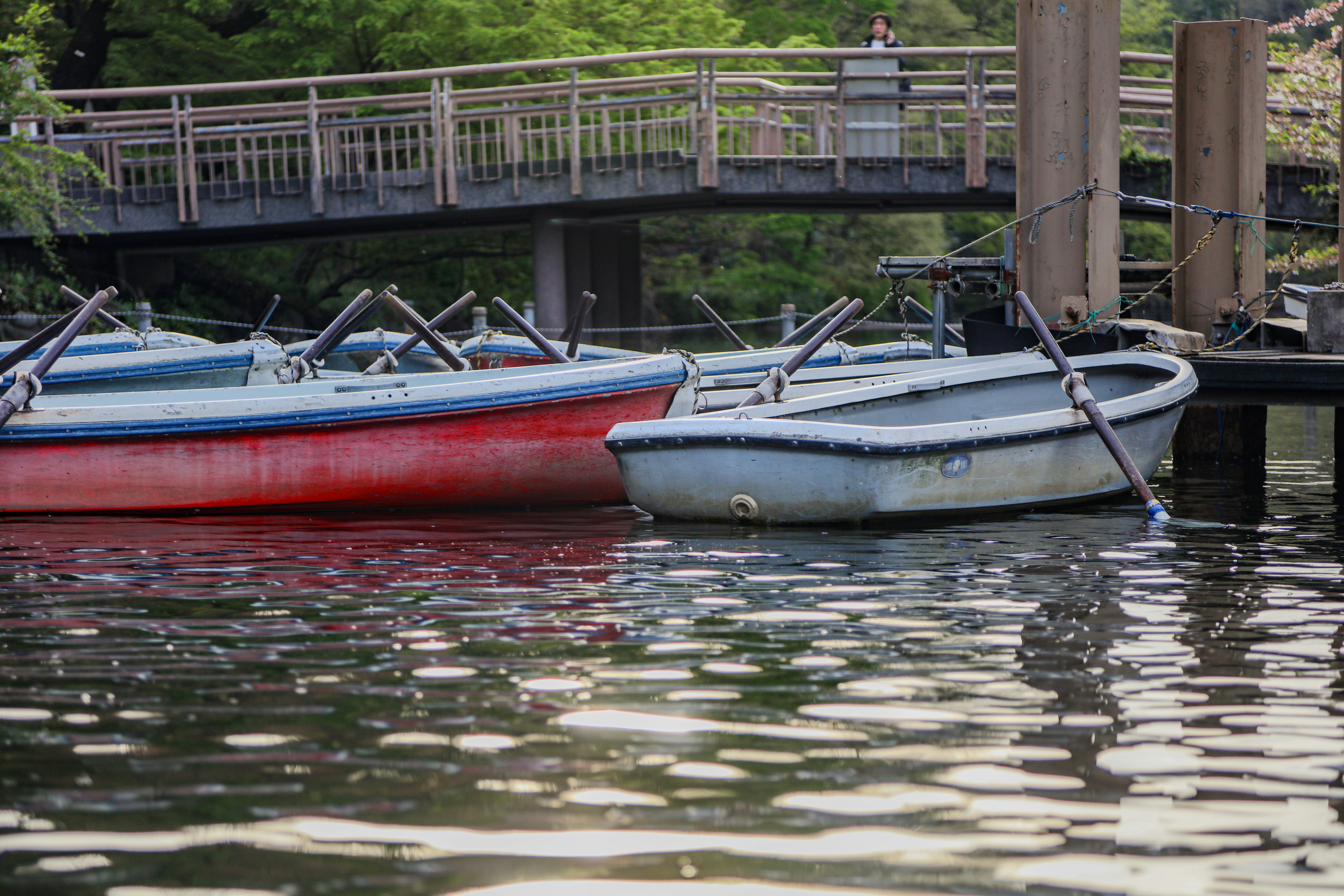 A couple of boats that are sitting in the water