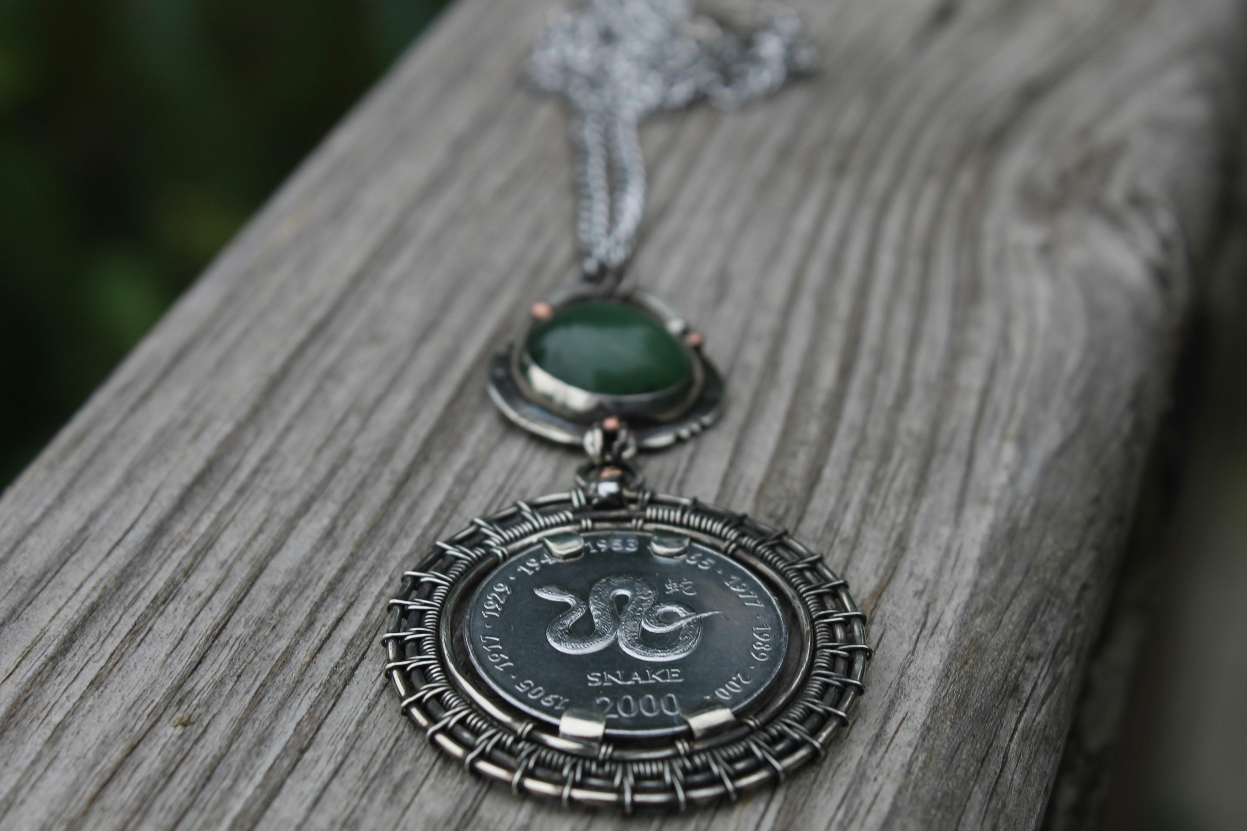 A necklace with a picture of a person on it