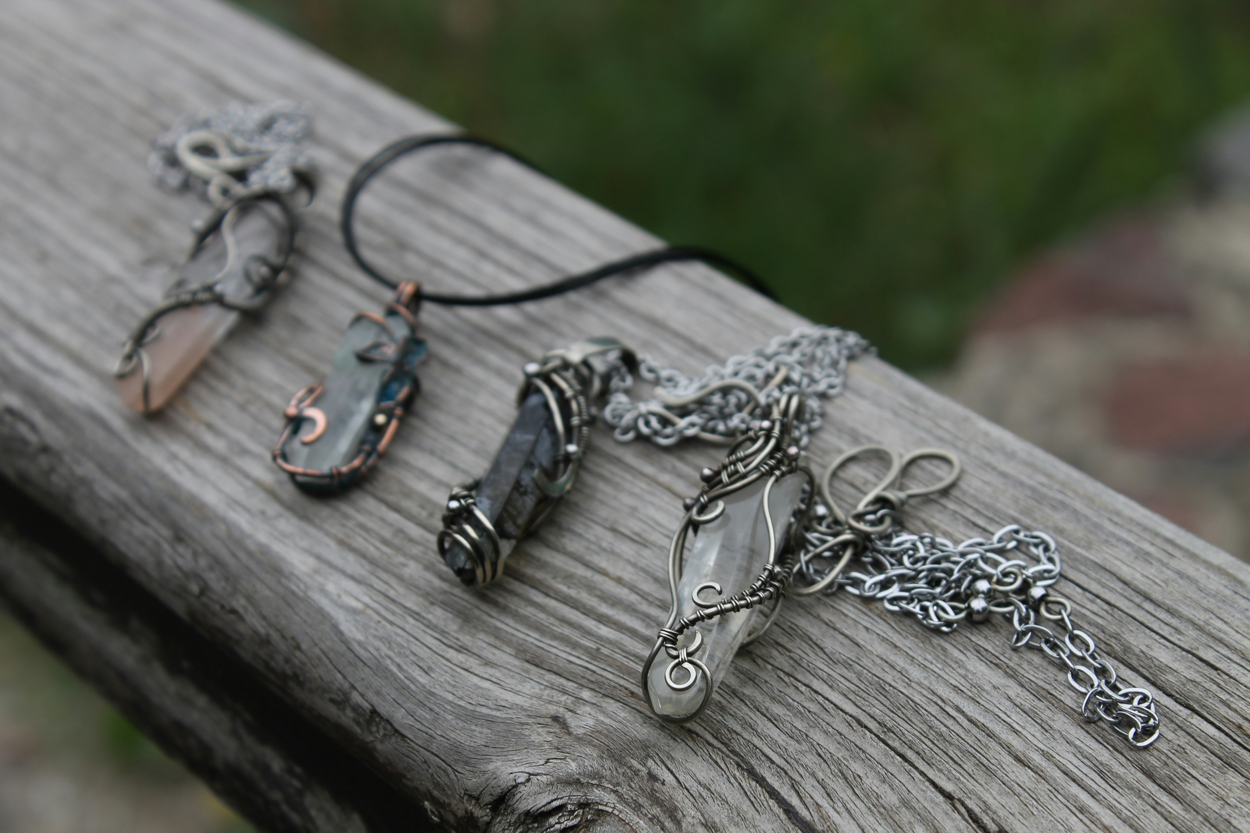 A wooden bench with a bunch of different items on it