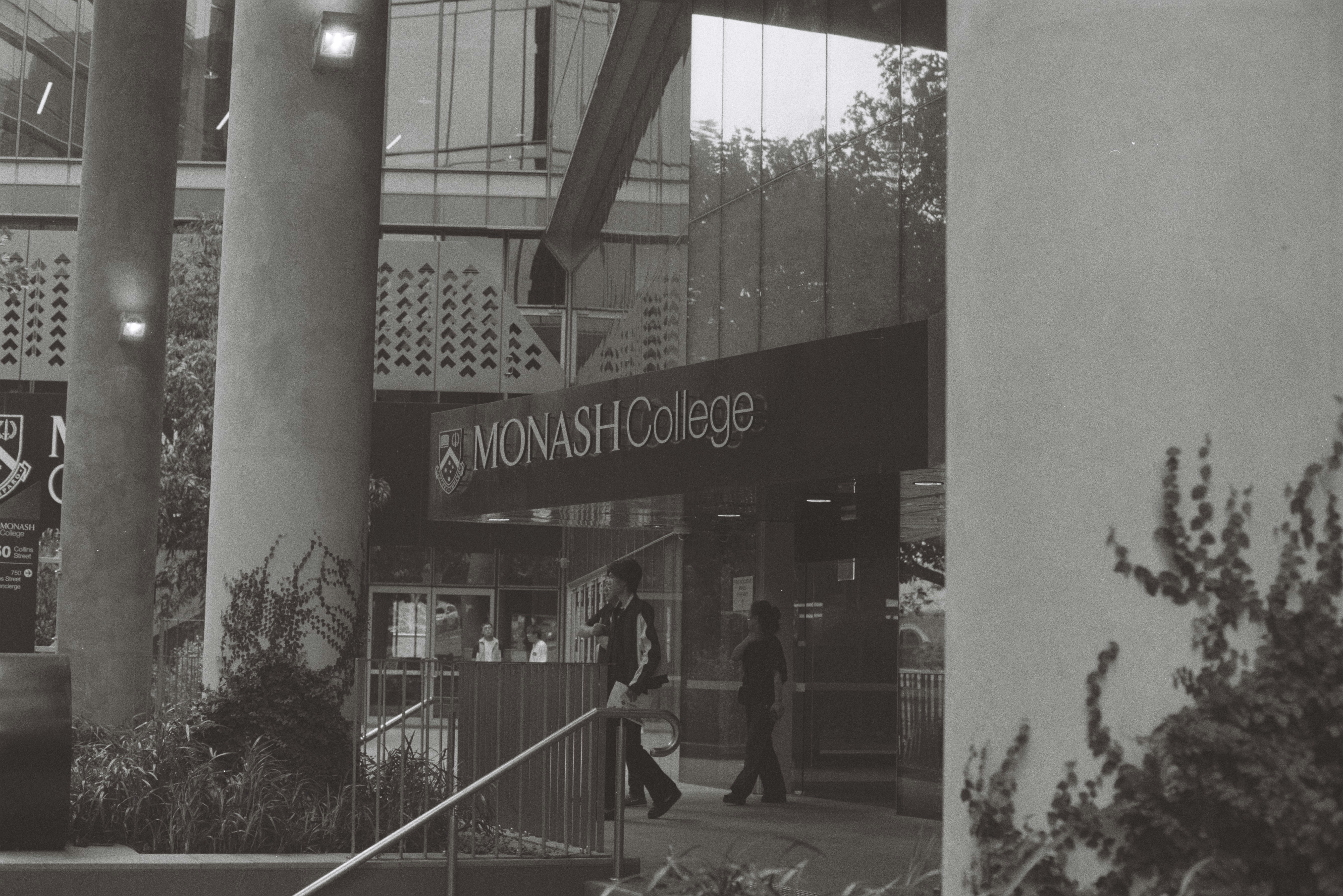 A black and white photo of a store front