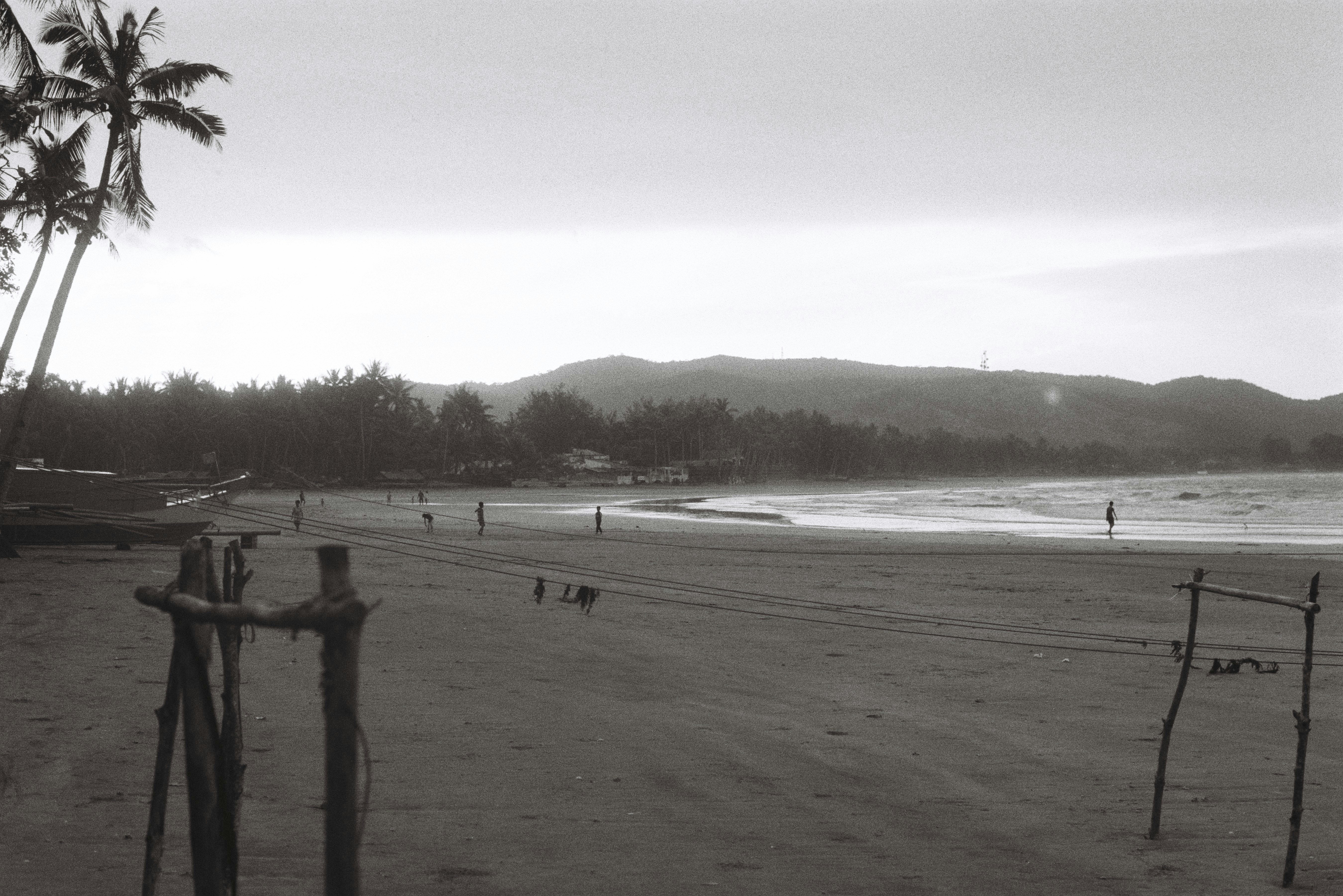 A black and white photo of a beach