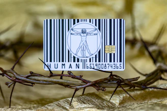 A close up of a barcode with a picture of jesus on it