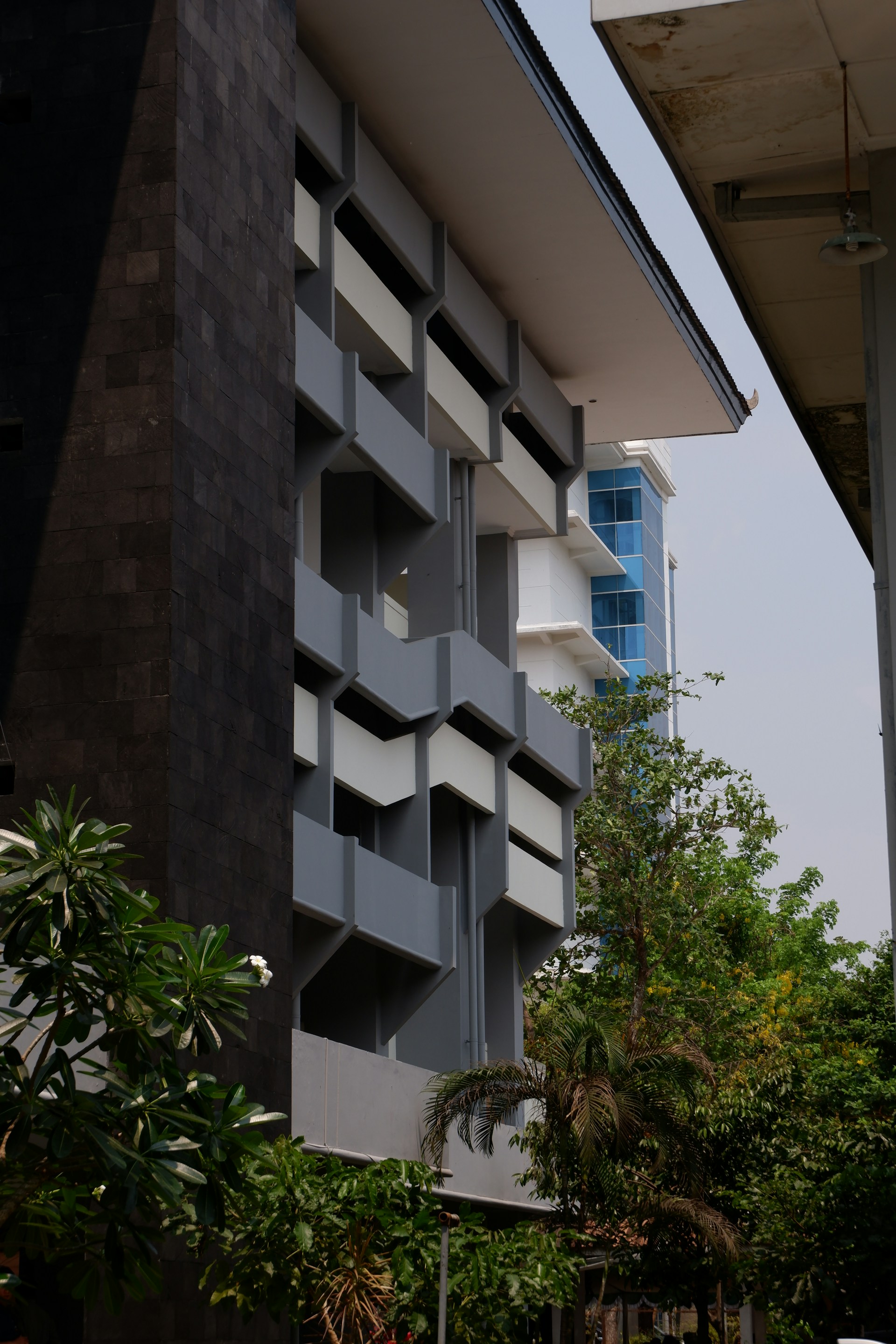 A tall building with a clock on the side of it