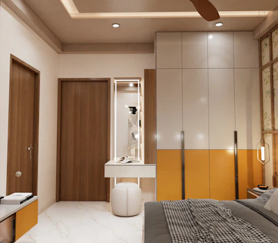 A bedroom with a ceiling fan and a bed