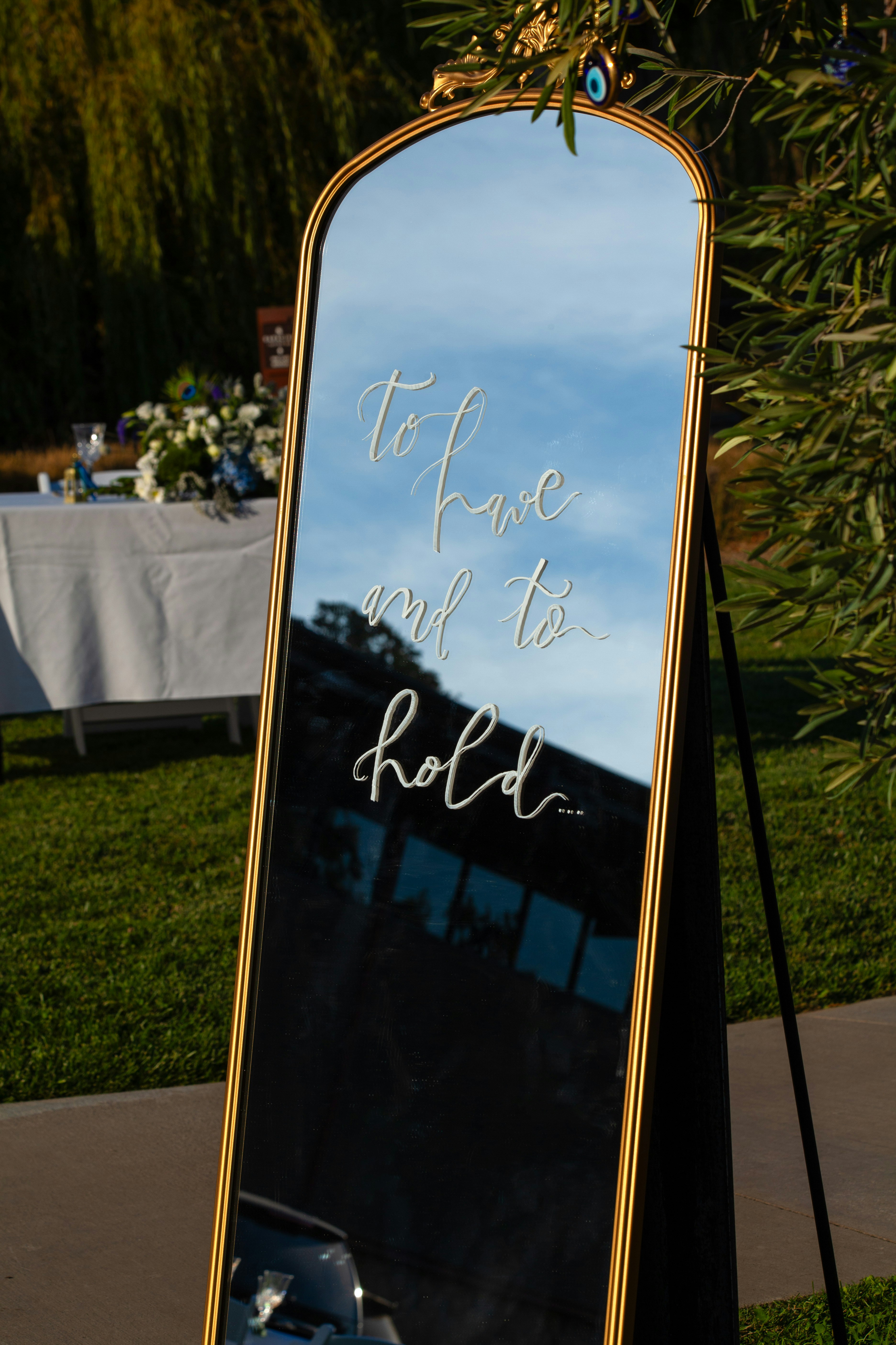 A large mirror with writing on it