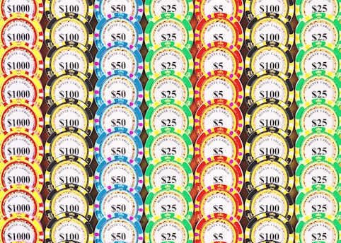 A lot of different colored casino chips