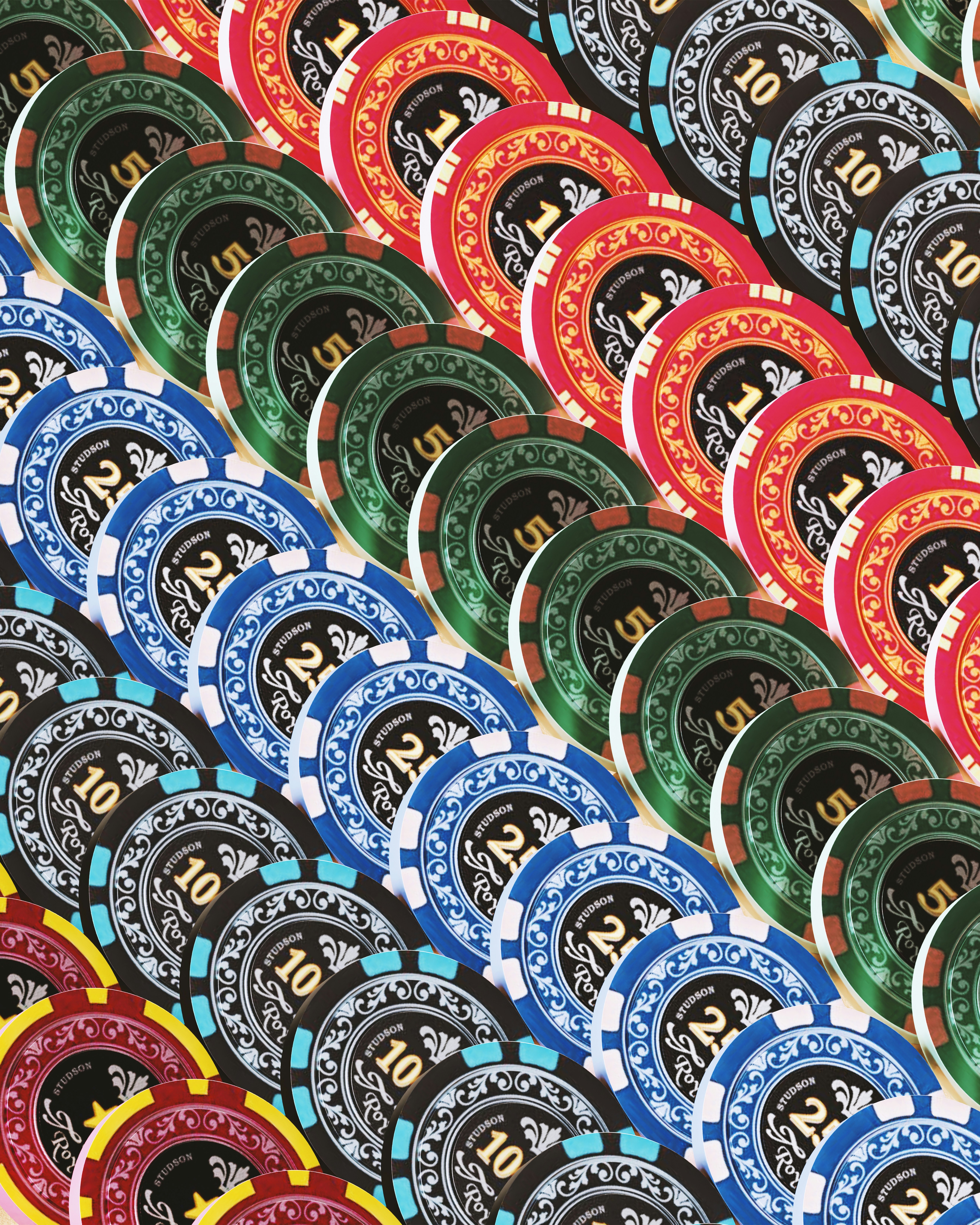 A pile of poker chips sitting on top of a table