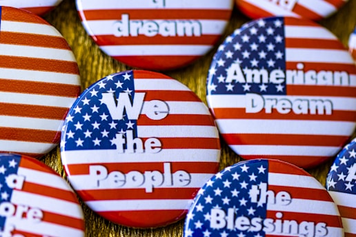 We the people buttons with american flags on them